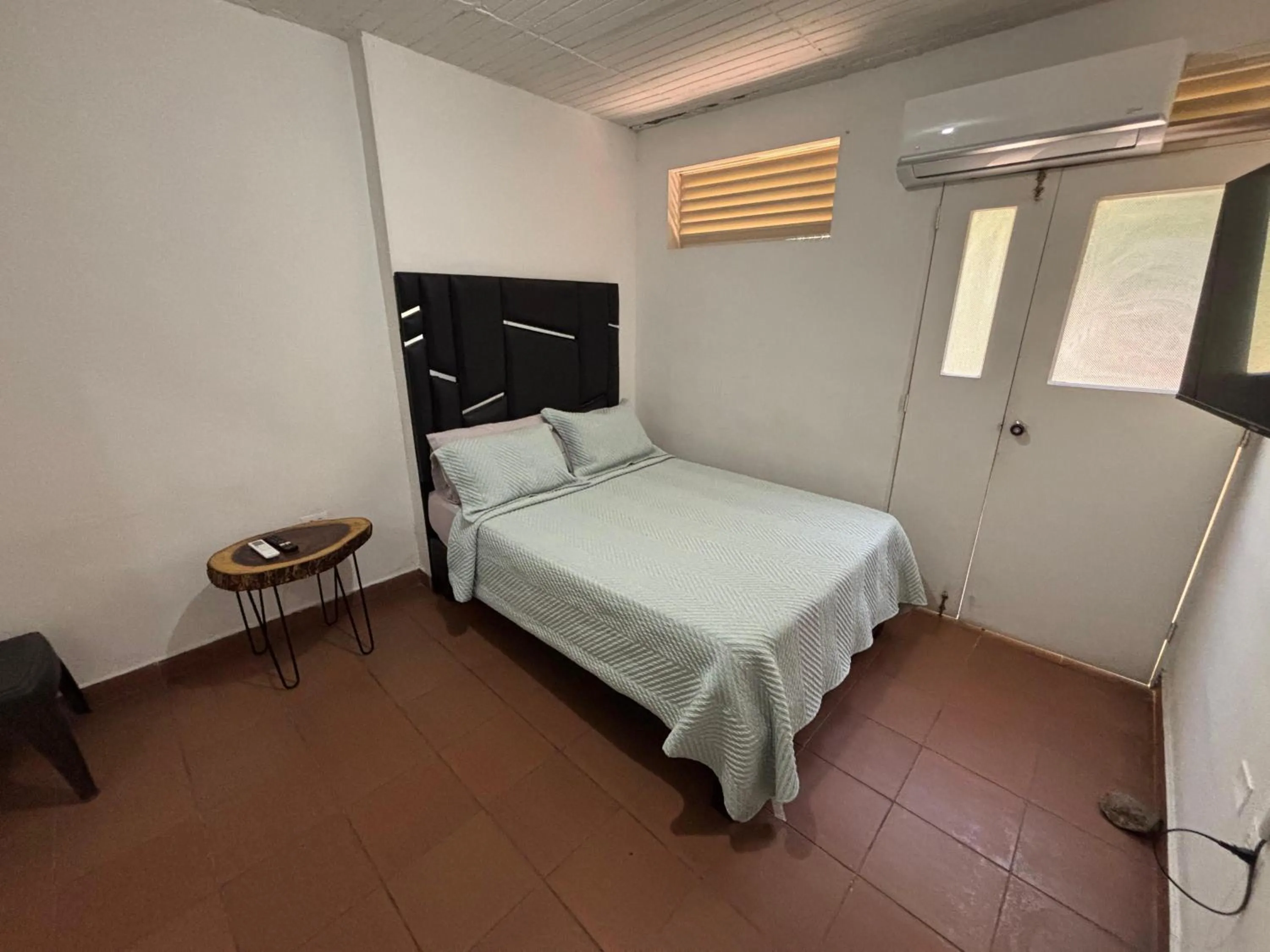 Bed in OUR HOME SAN ANTONIO