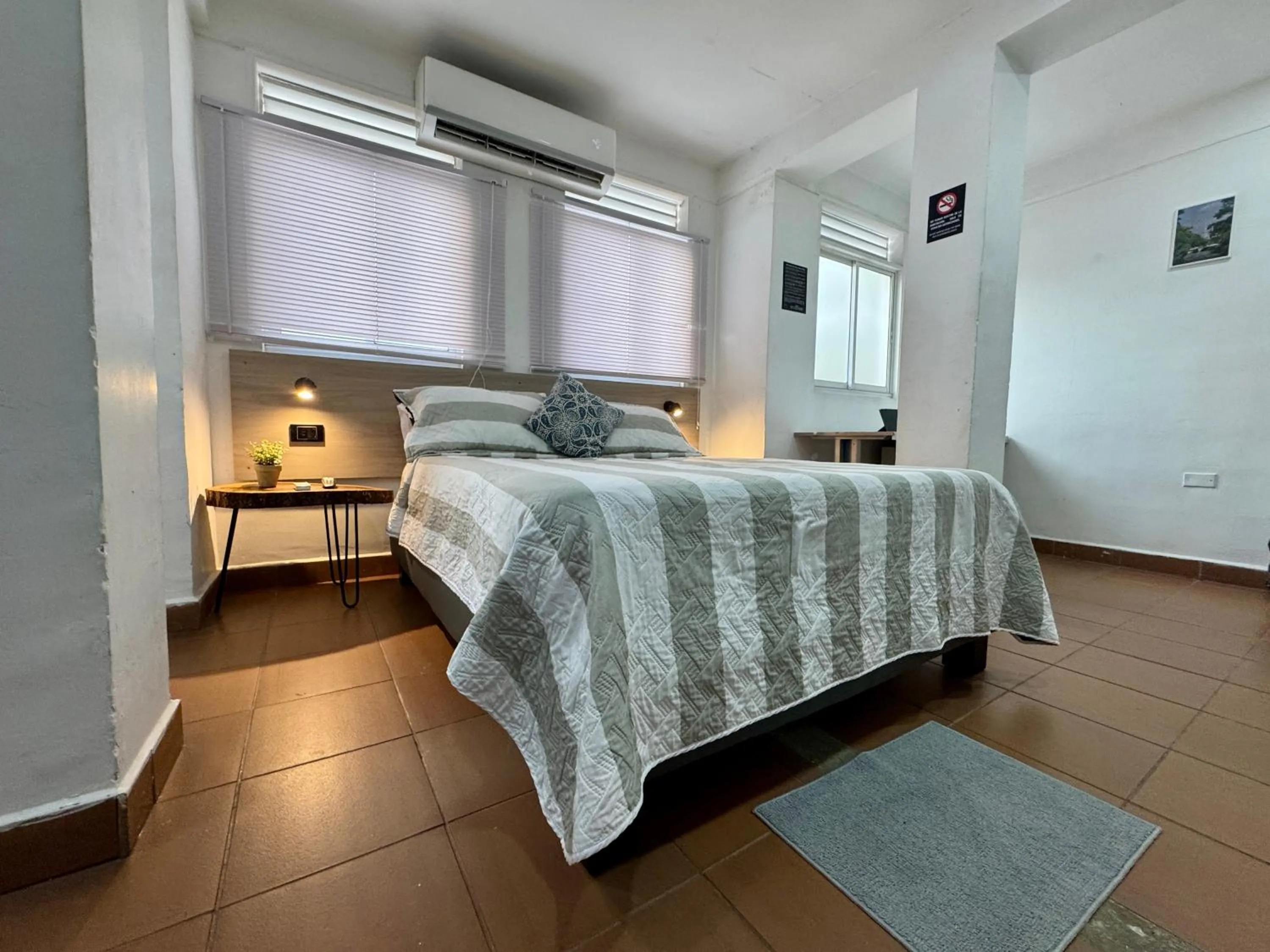 Bed in OUR HOME SAN ANTONIO