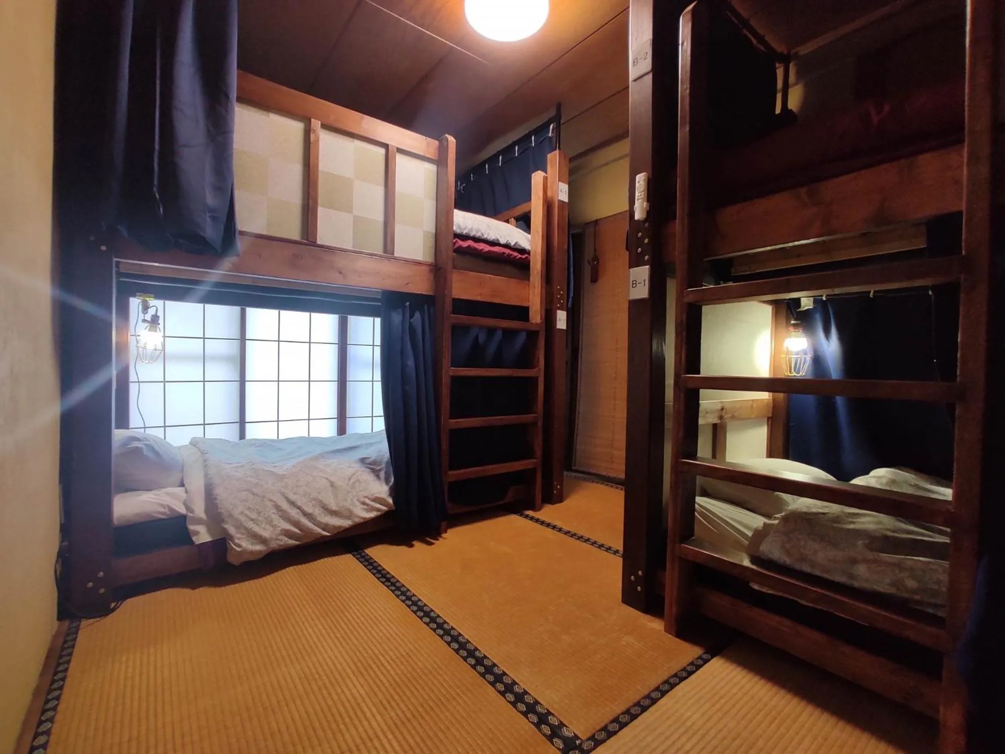 Bedroom, Bed in Guesthouse Kincha 駅東口