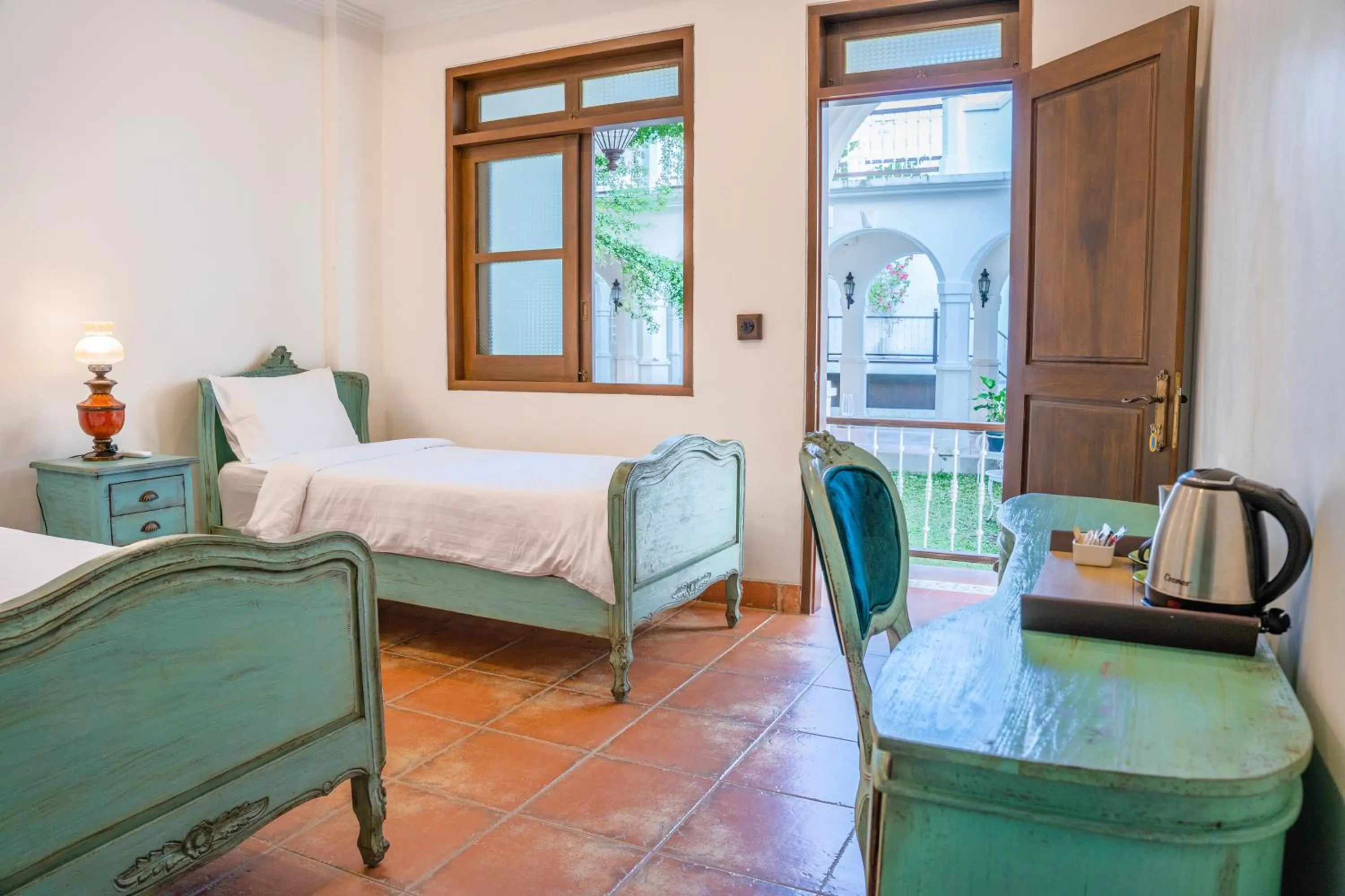 Coffee/tea facilities, Bed in Pitaloka Hotel Sanur By DeWizZ Management