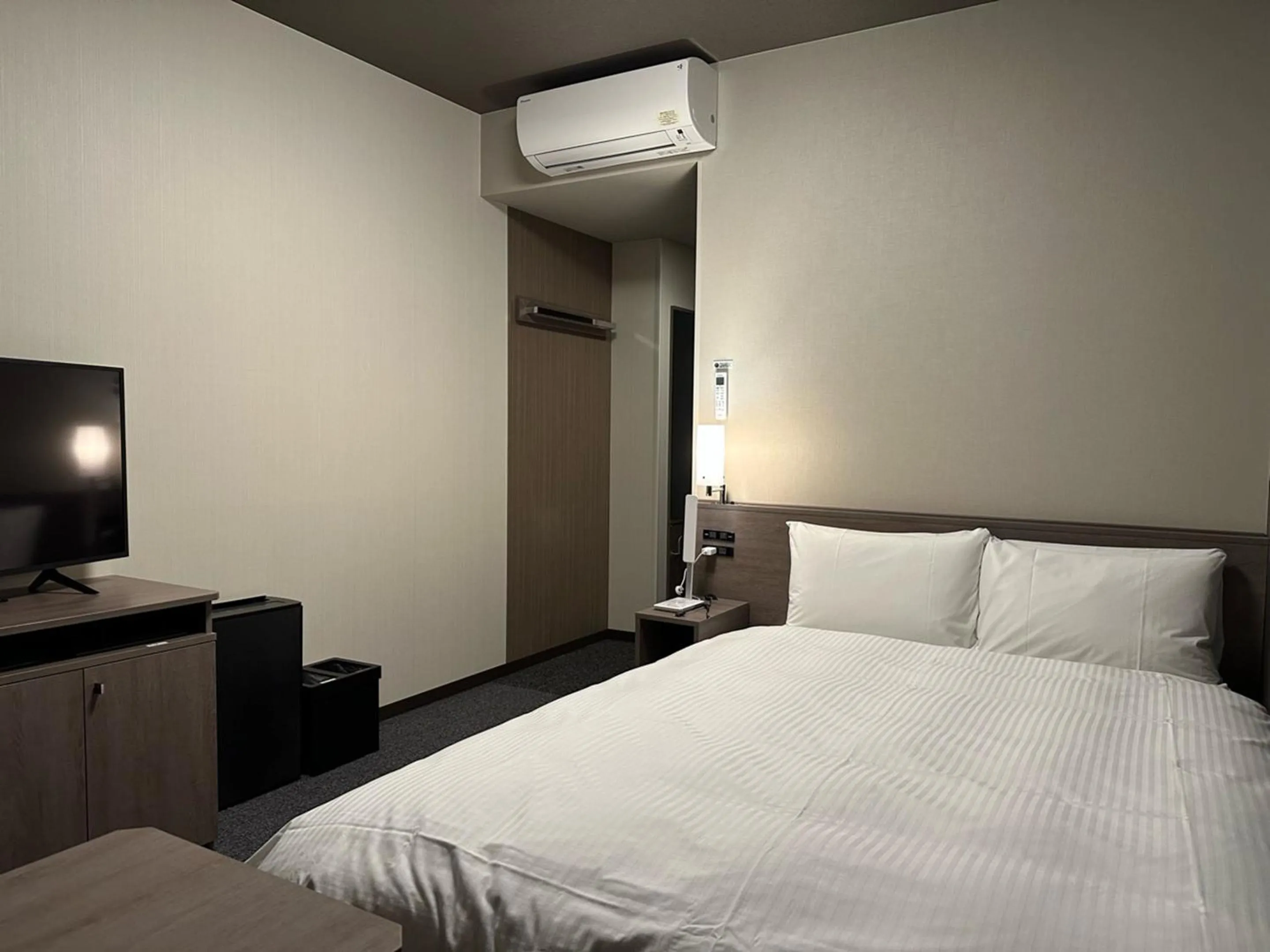 Photo of the whole room, Bed in Hotel Route Inn Numata
