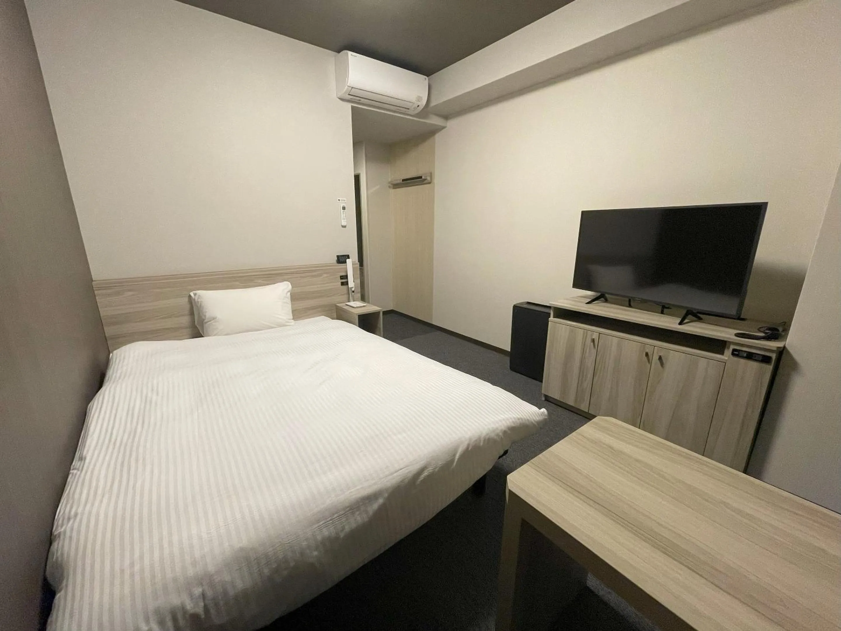 Photo of the whole room, Bed in Hotel Route Inn Numata