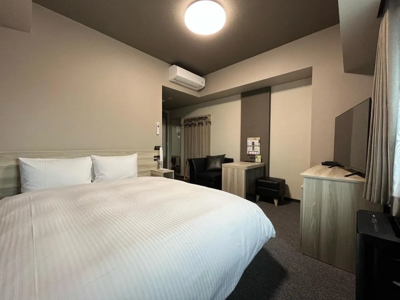 Photo of the whole room, Bed in Hotel Route Inn Numata