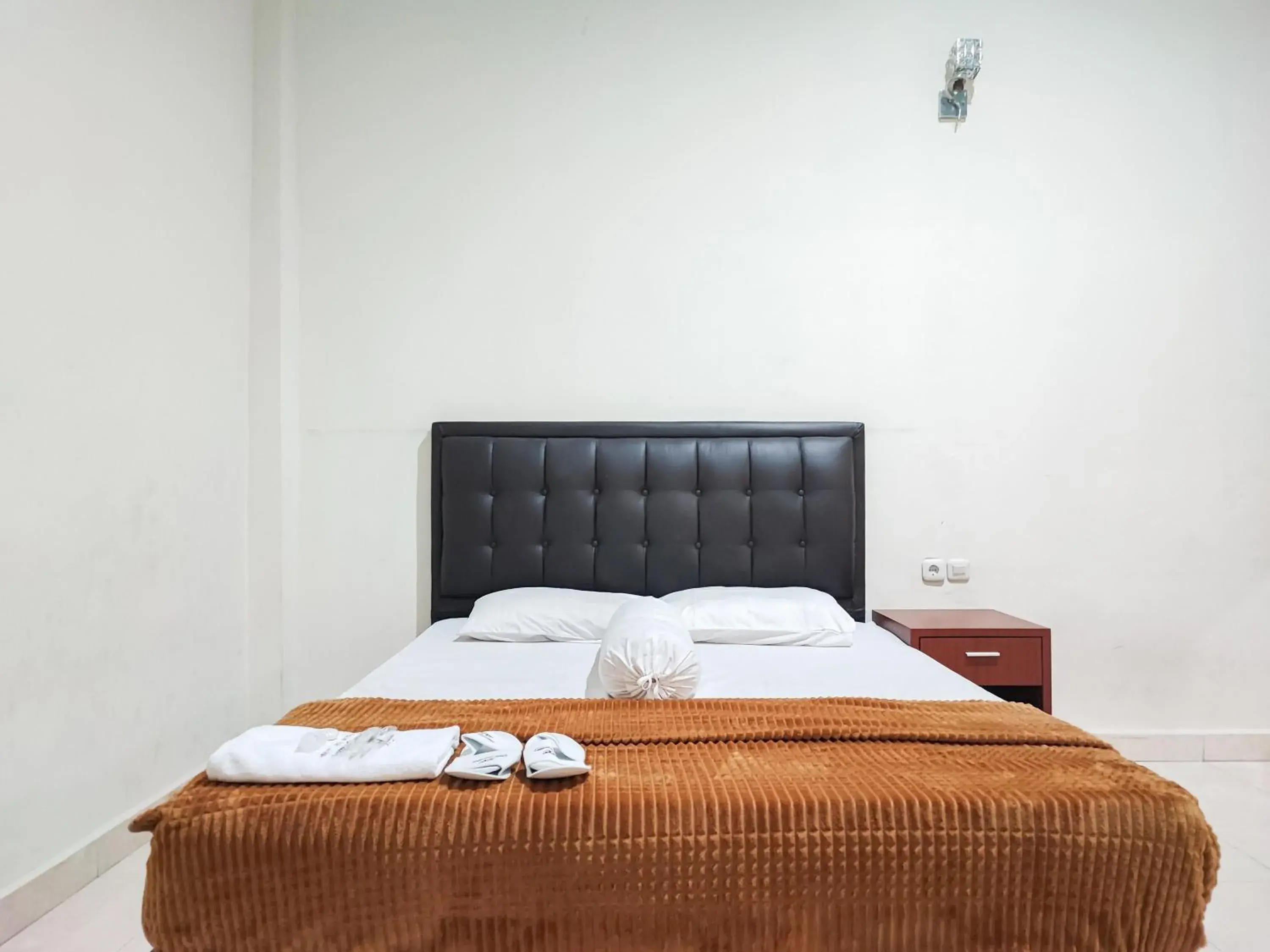 Bed in RedDoorz Plus Syariah near Simpang Rimbo Jambi Bed in RedDoorz Plus Syariah near Simpang Rimbo Jambi