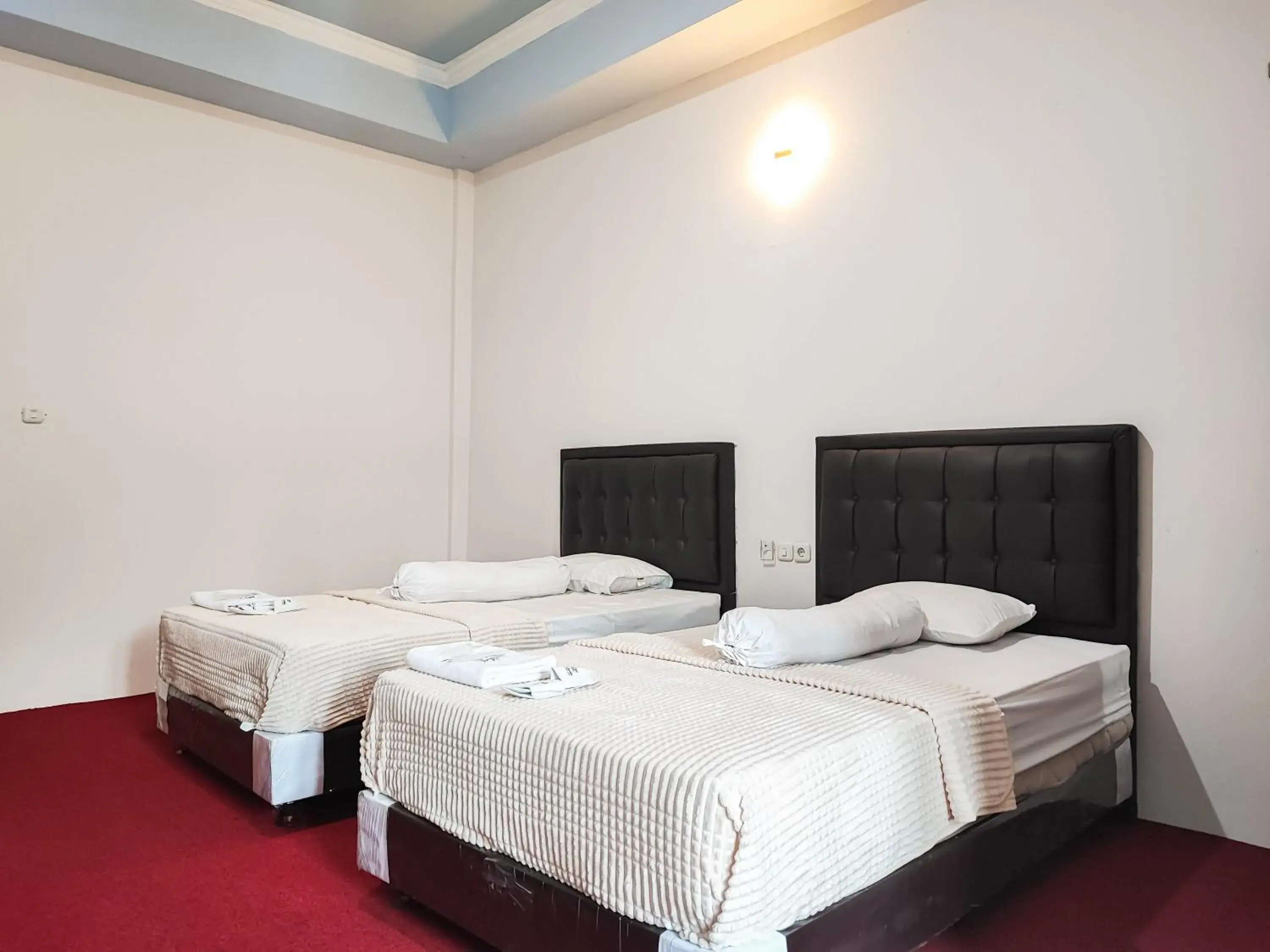 Bed in RedDoorz Plus Syariah near Simpang Rimbo Jambi Bed in RedDoorz Plus Syariah near Simpang Rimbo Jambi