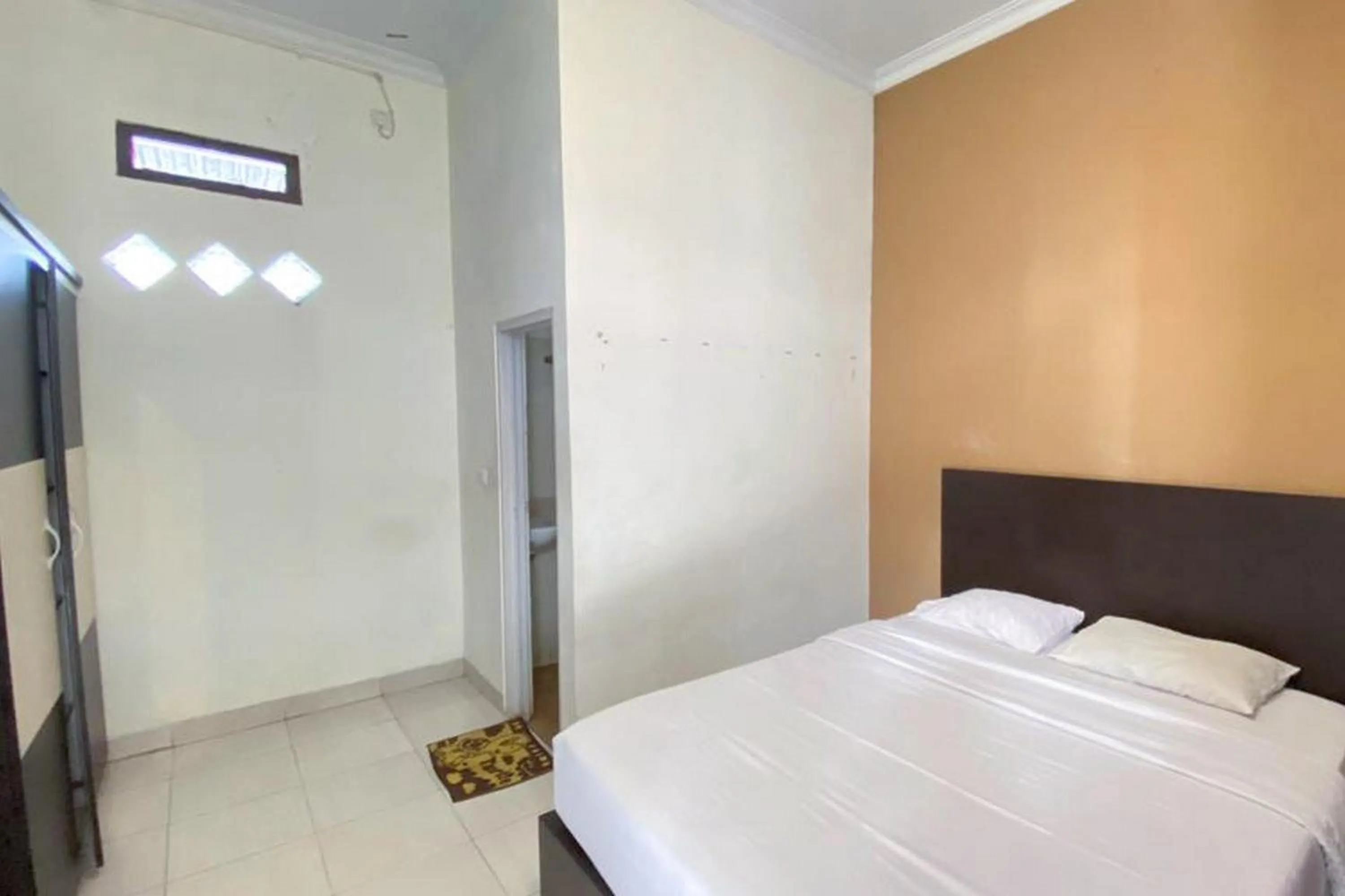 Bed in RedDoorz Syariah @ Jalan Jendral Sudirman Pekanbaru