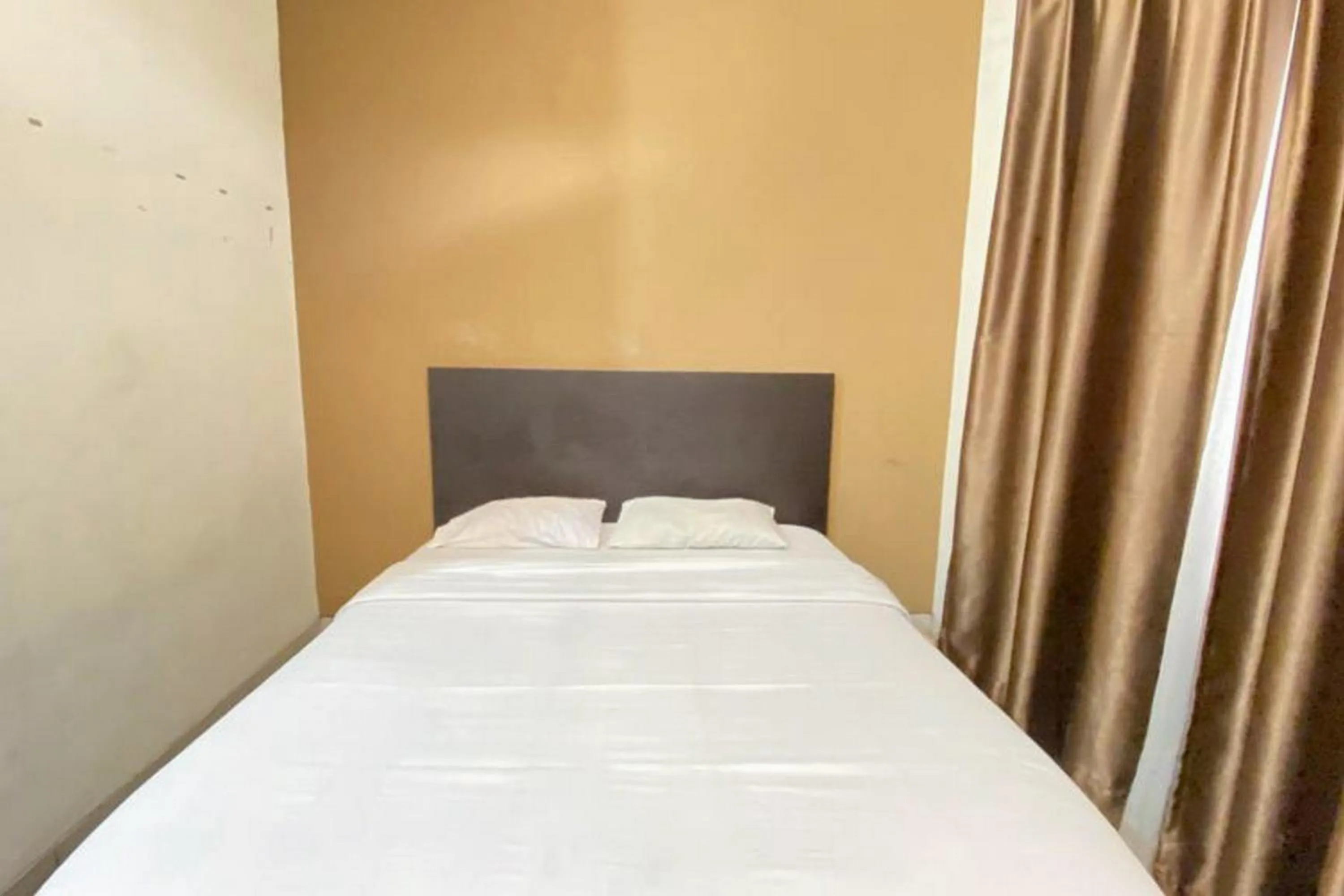 Bed in RedDoorz Syariah @ Jalan Jendral Sudirman Pekanbaru