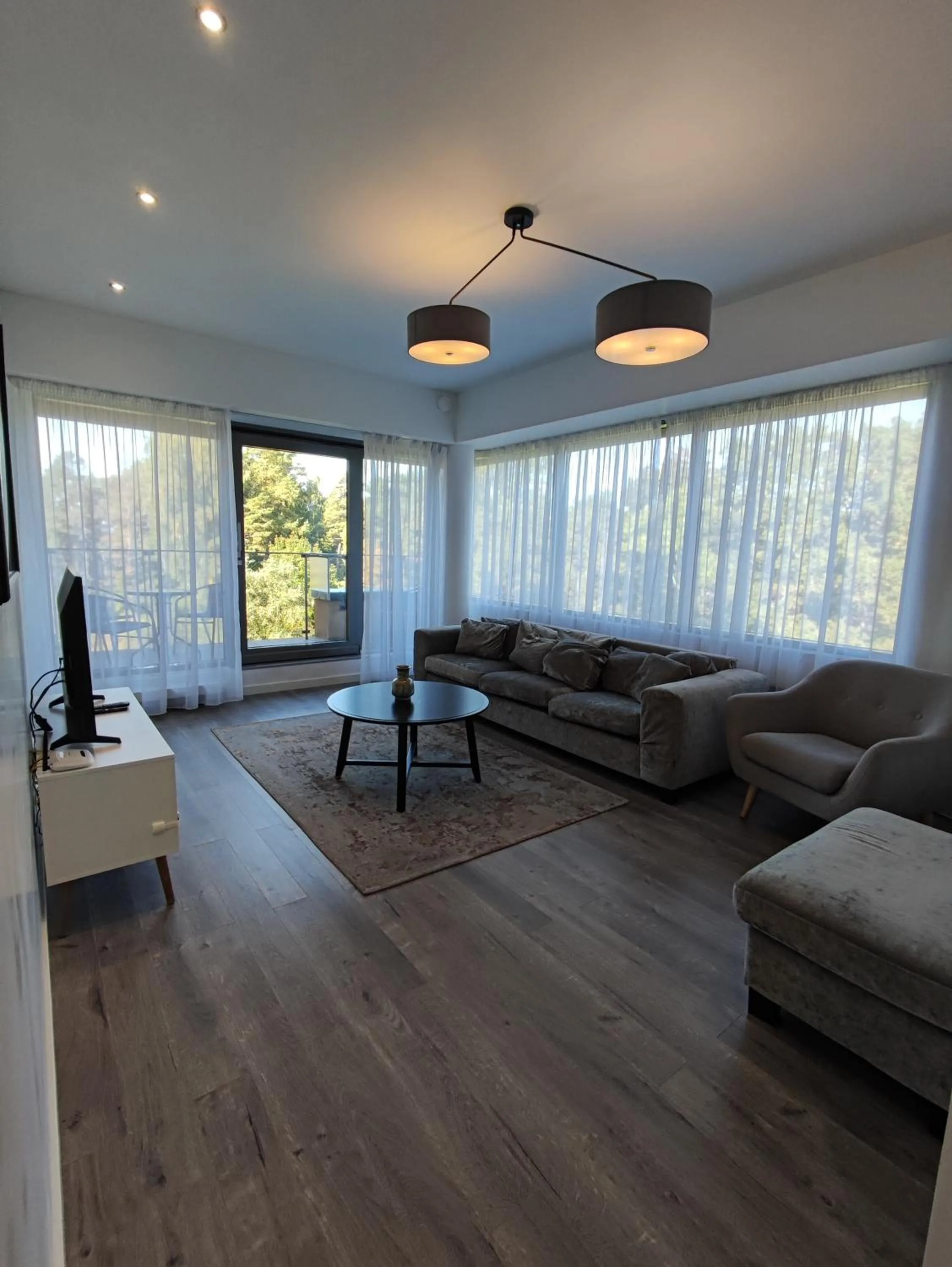 TV and multimedia in Saules Club Apart Hotel