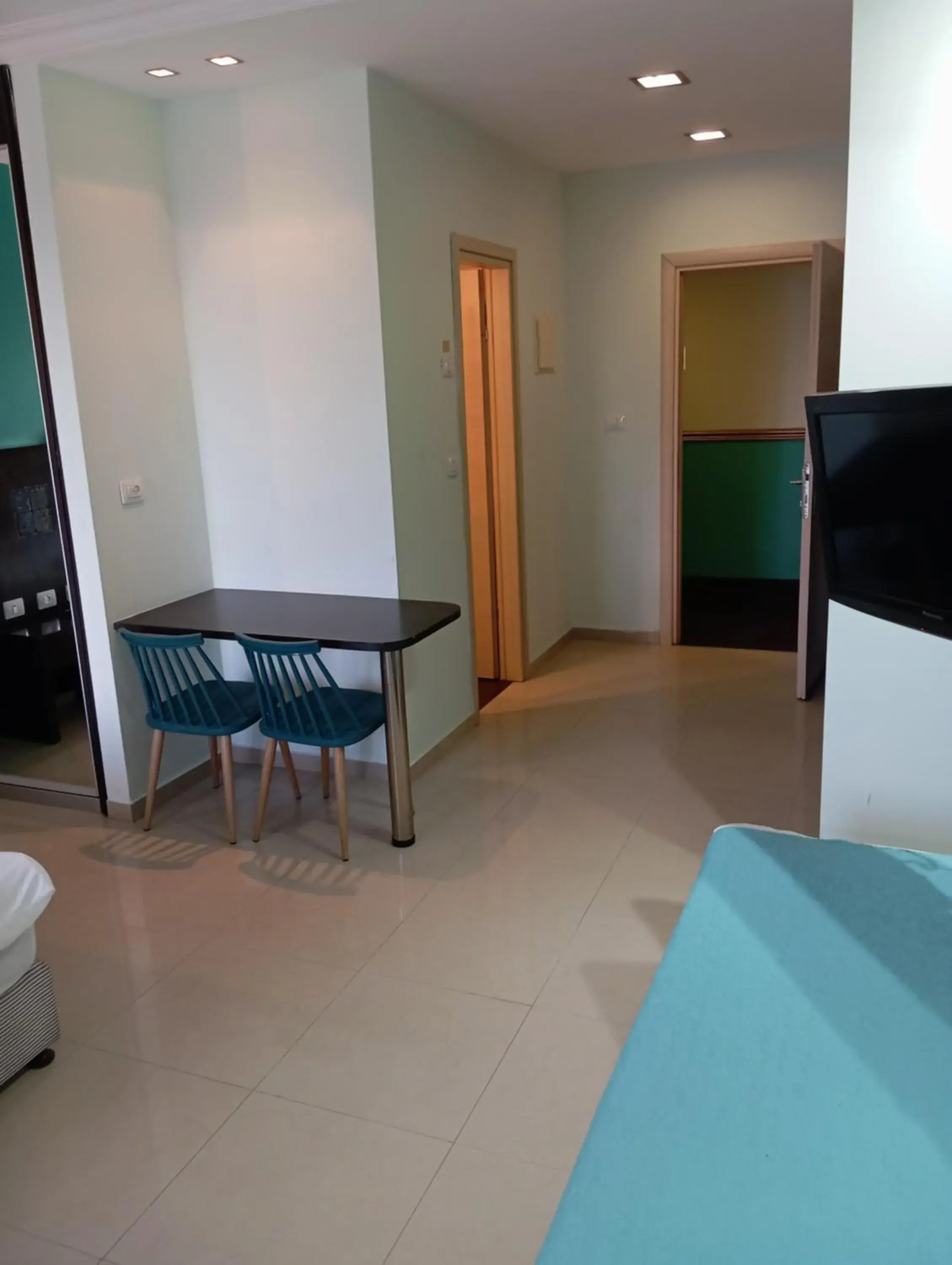 Seating area, Bed in Marina Beach Hotel Seating area, Bed in Marina Beach Hotel