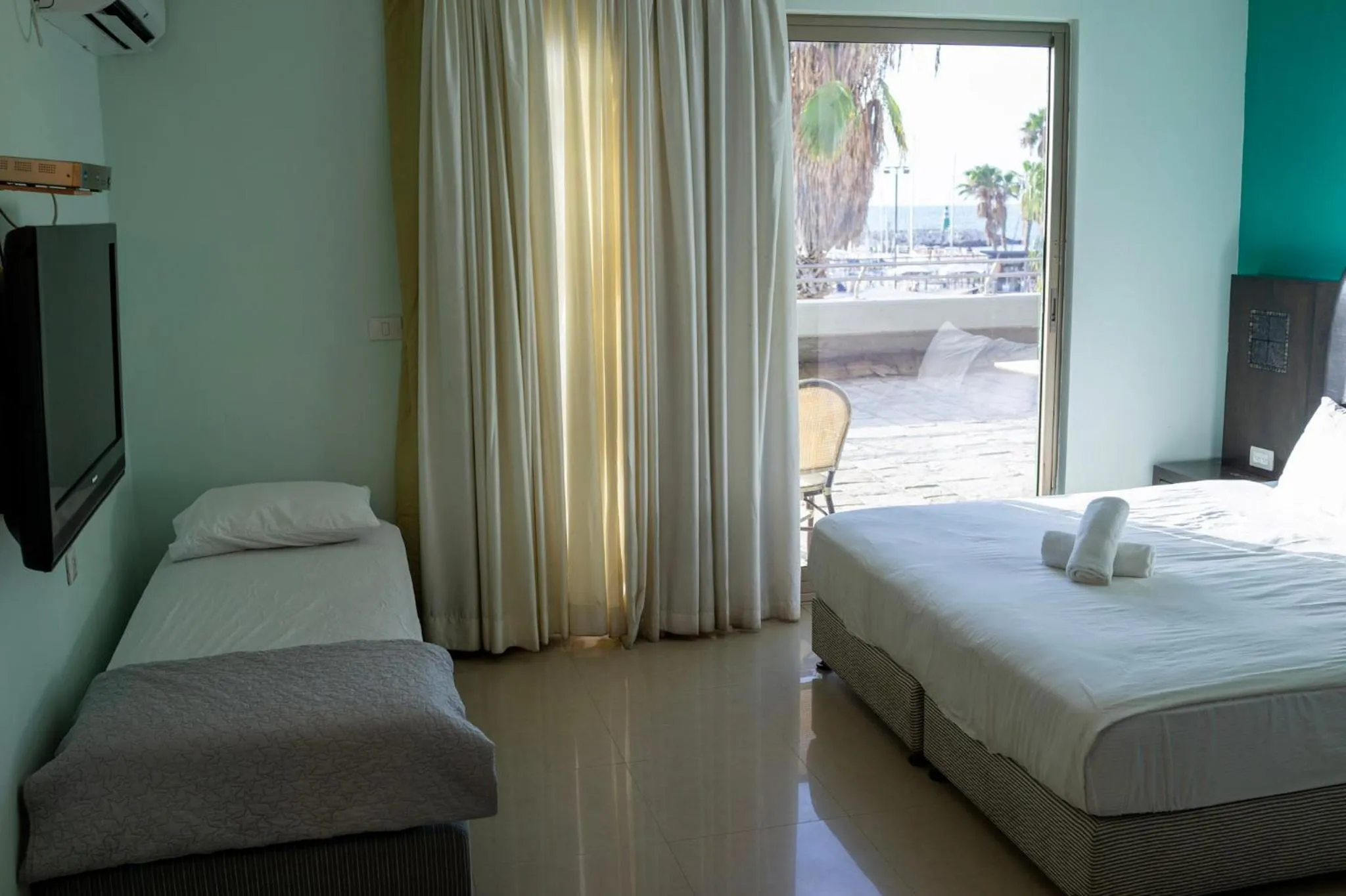 Bed in Marina Beach Hotel