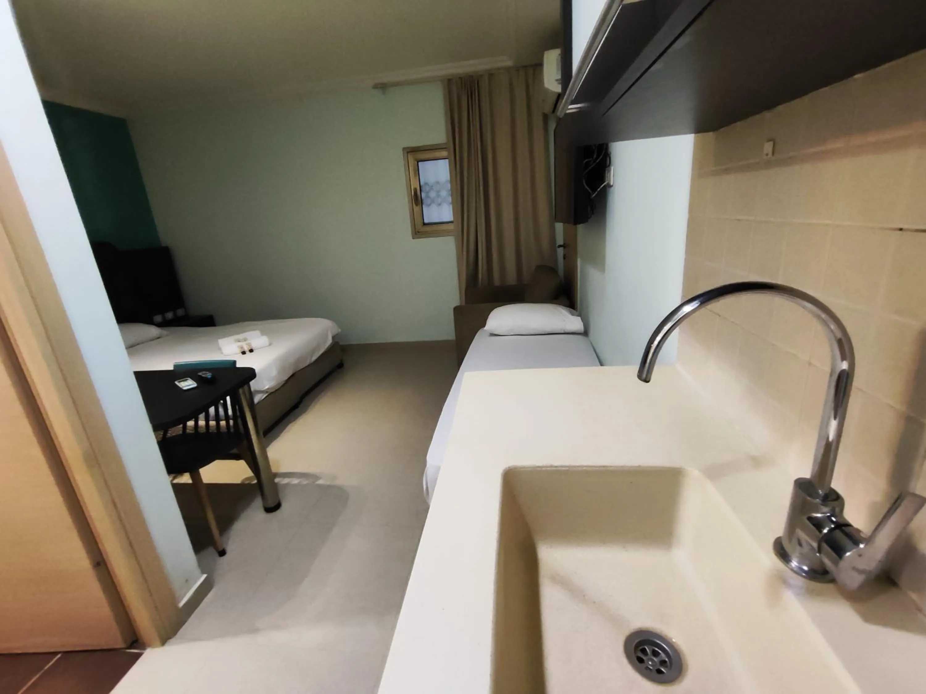 Bed in Marina Beach Hotel