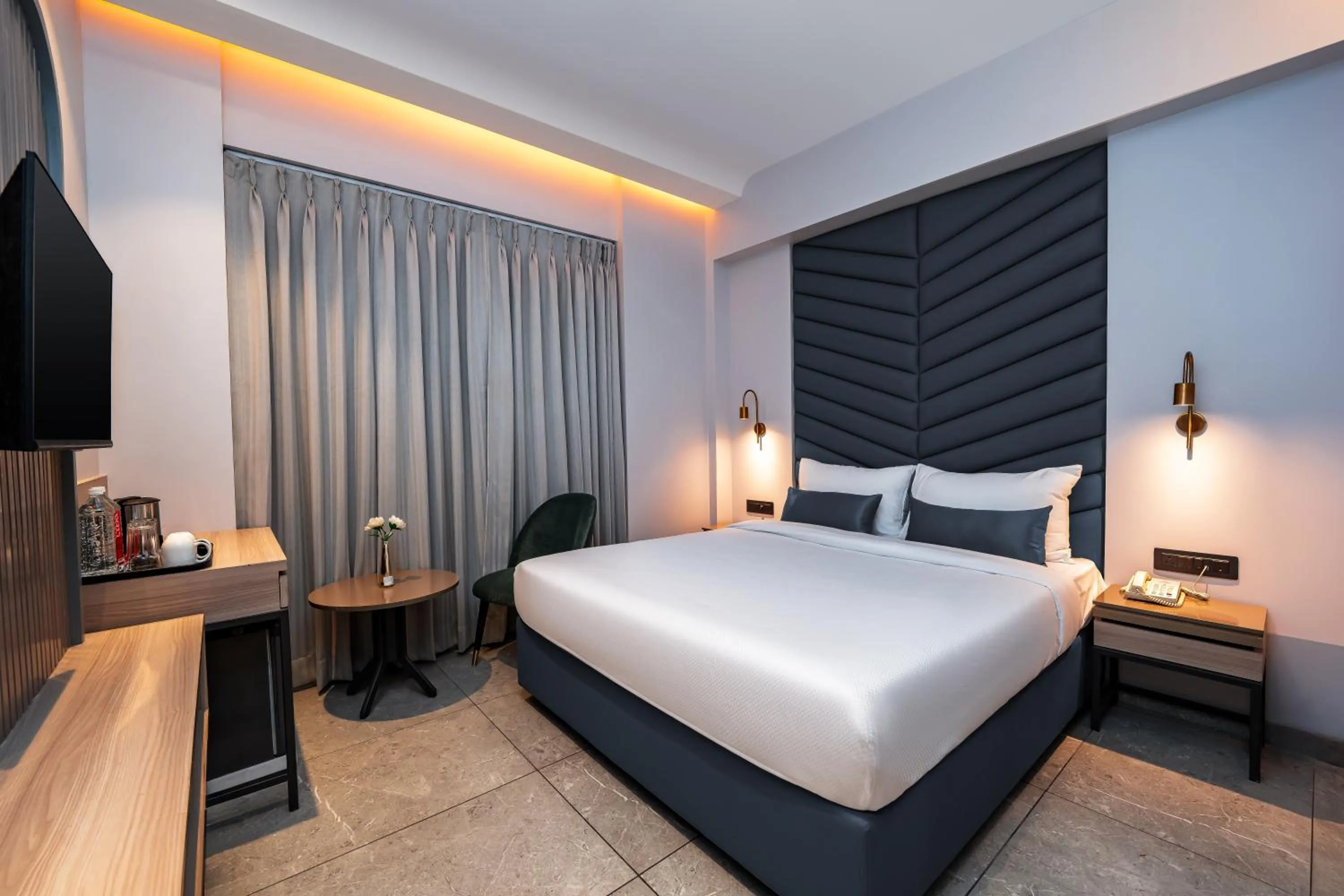 Bed in Ajanta Continental-Mumbai Airport