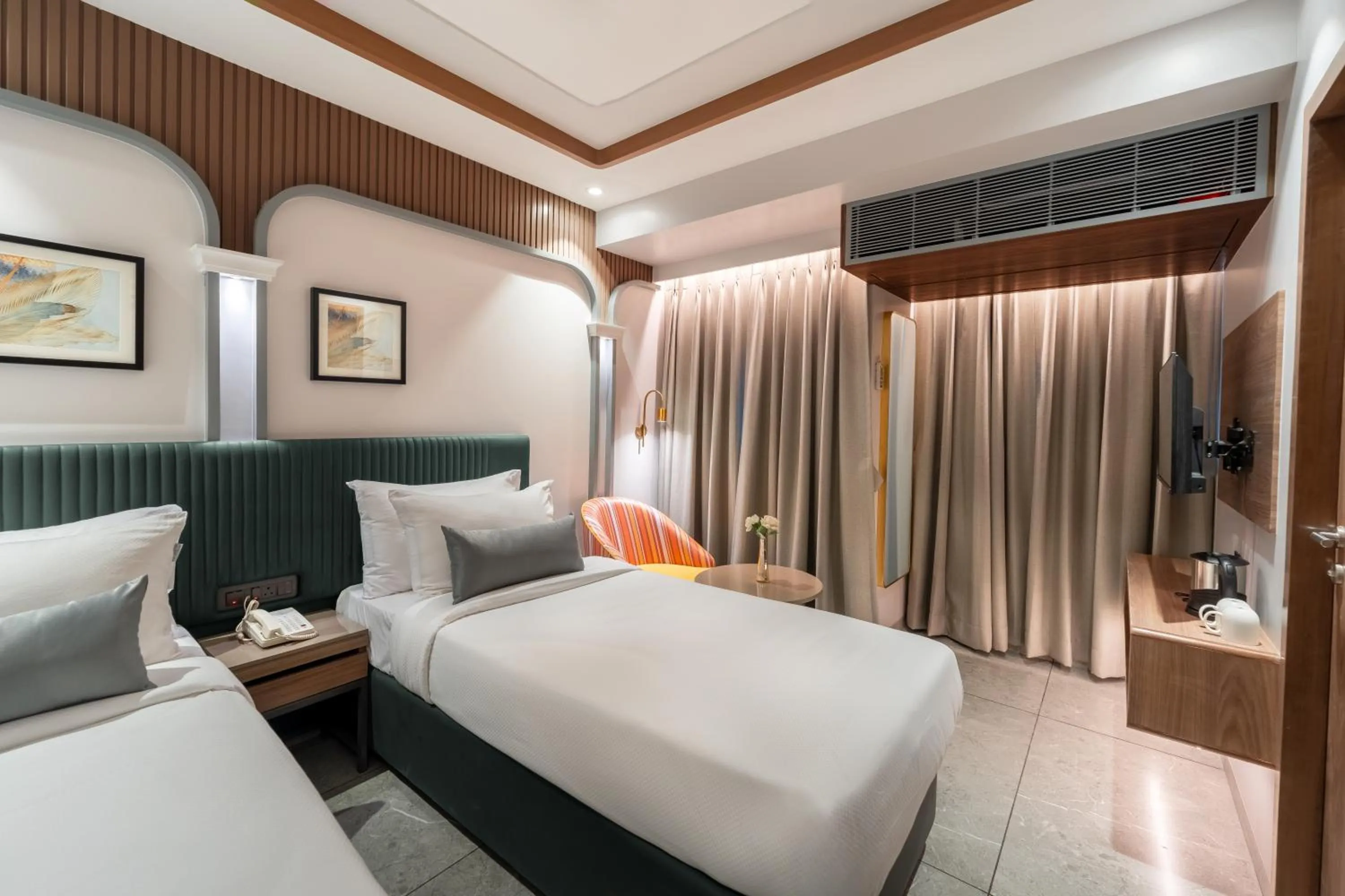 Bed in Ajanta Continental-Mumbai Airport