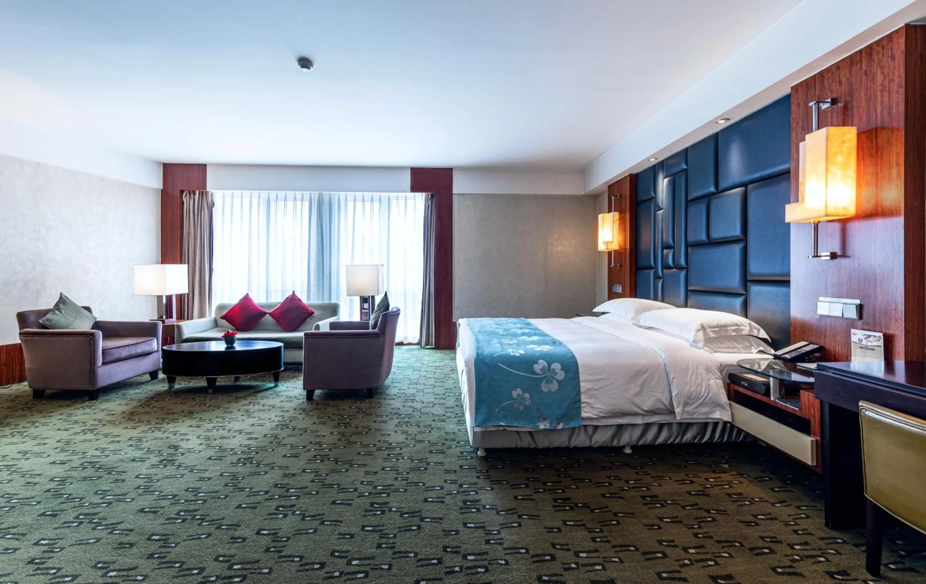 Bed in Beijing Kuntai Royal Hotel