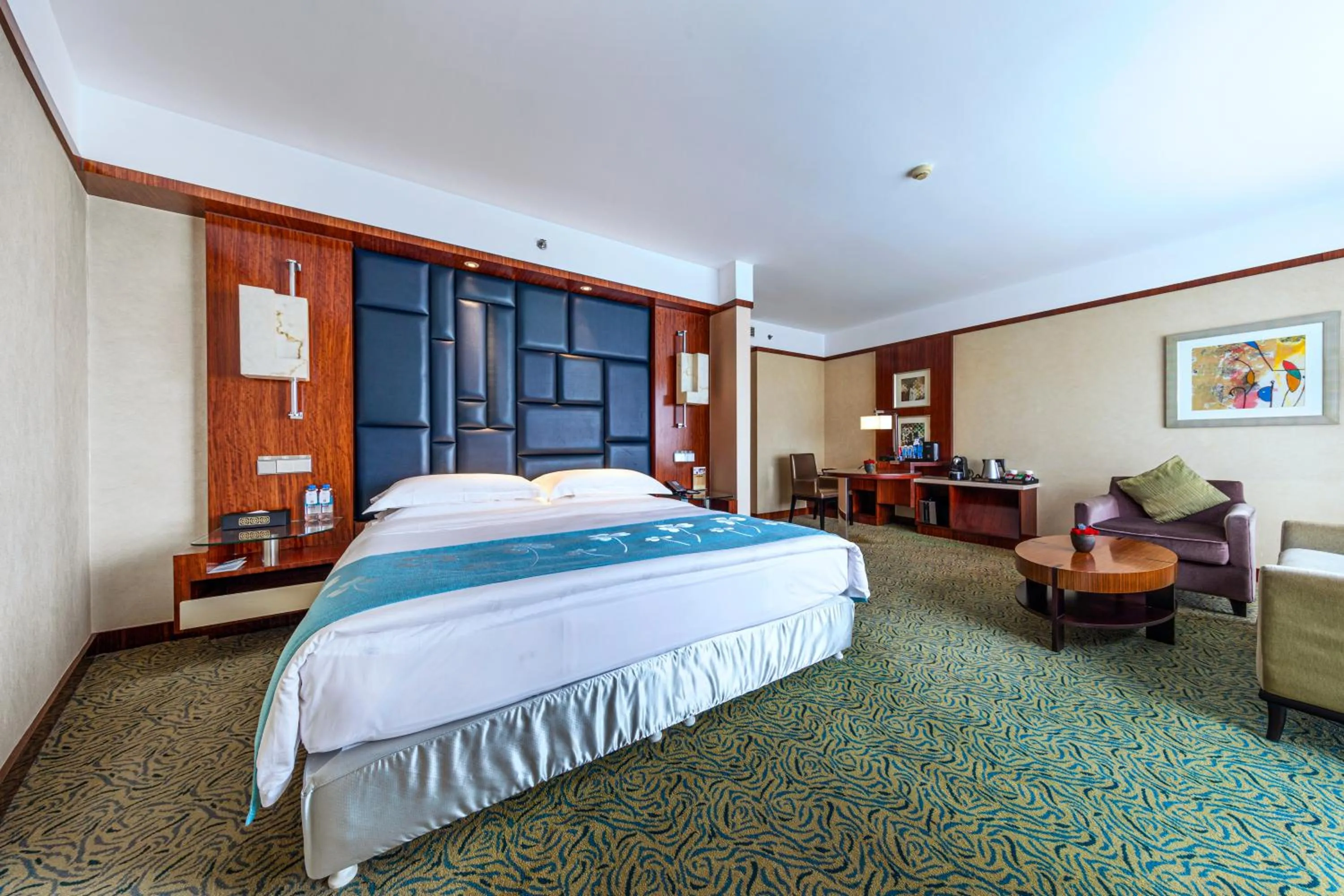 Bed in Beijing Kuntai Royal Hotel