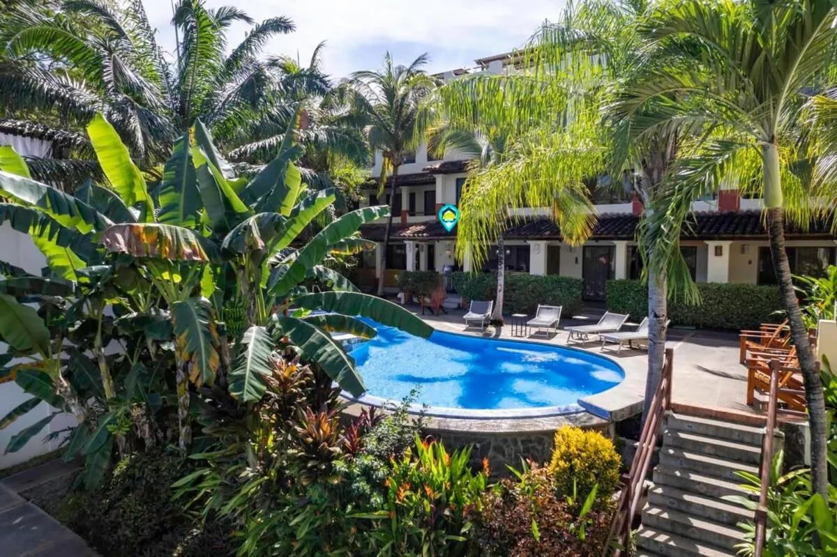 Modern Split-Level 2-Bedroom Condo with Pools, Terrace & Easy Beach Access