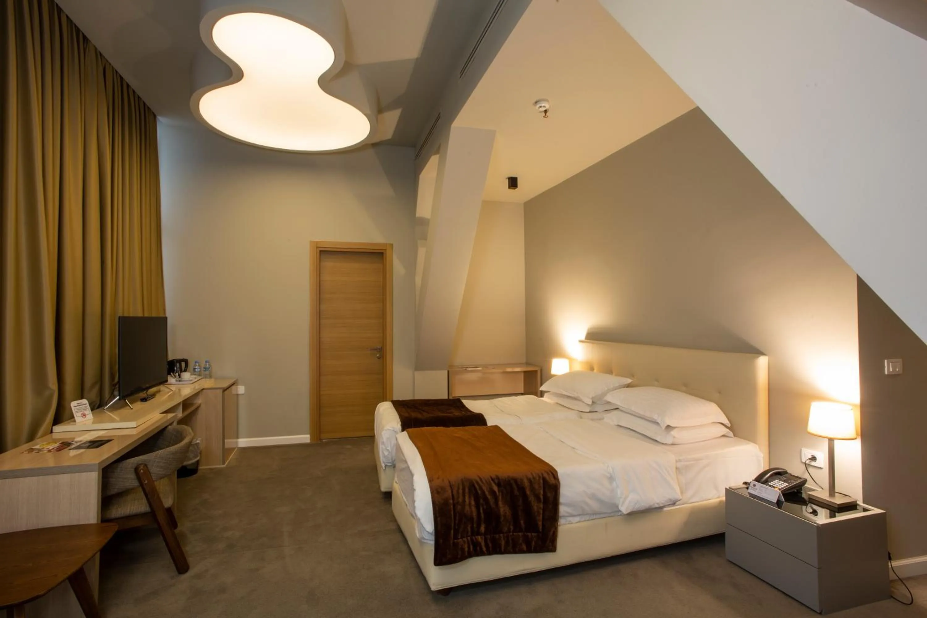 Bed in Best Western Premier Ark Hotel