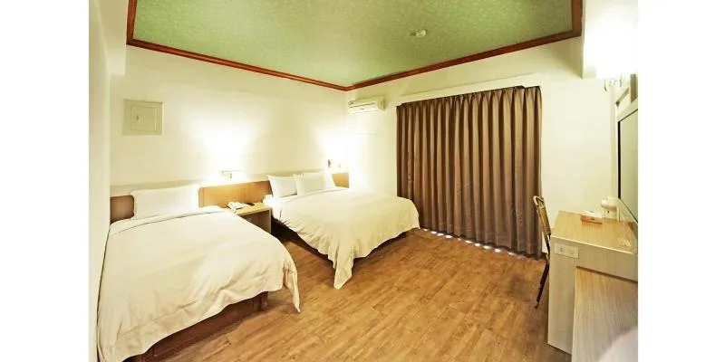Bed in Kenting Holiday Hotel