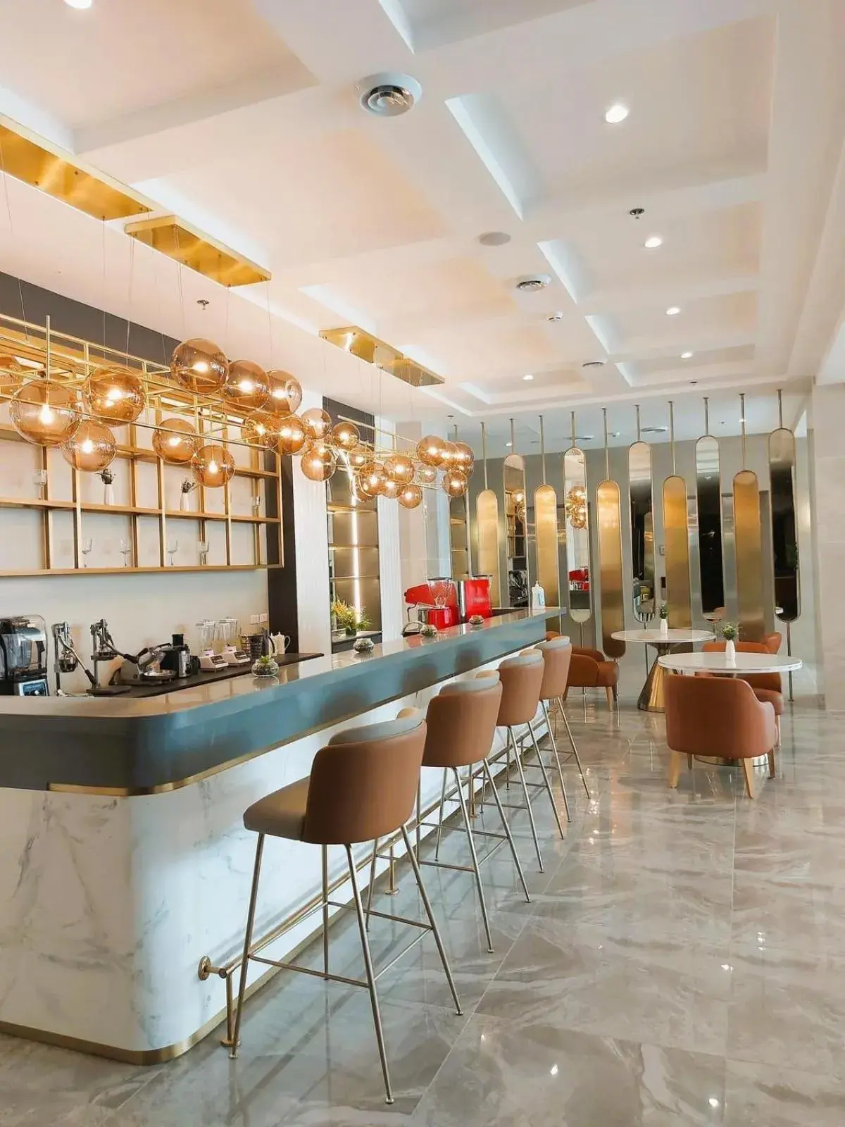 Lounge or bar in Uma Hotel and Residences Lounge or bar in Uma Hotel and Residences