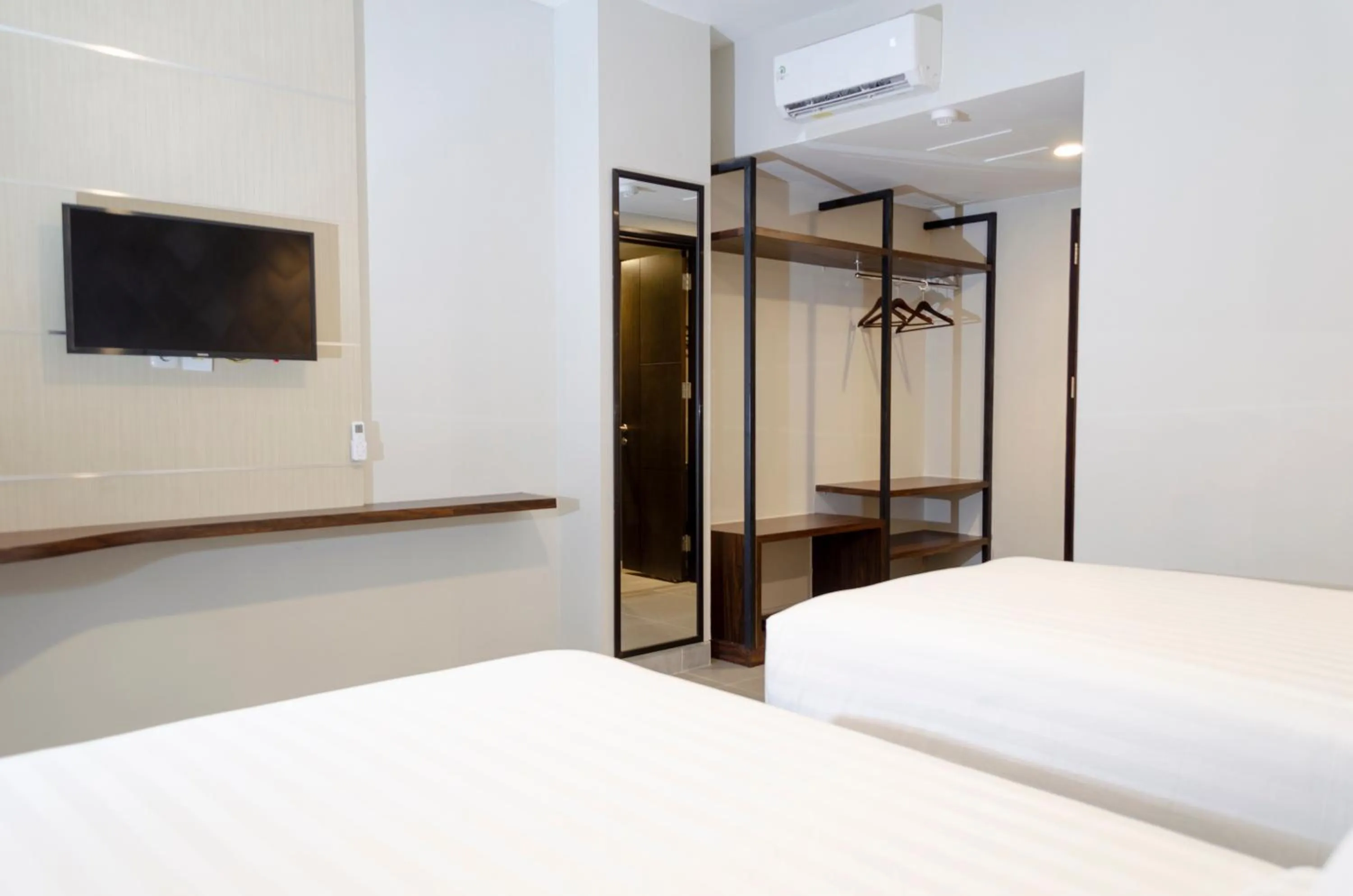 Bed in Arcadia Hotel Manado