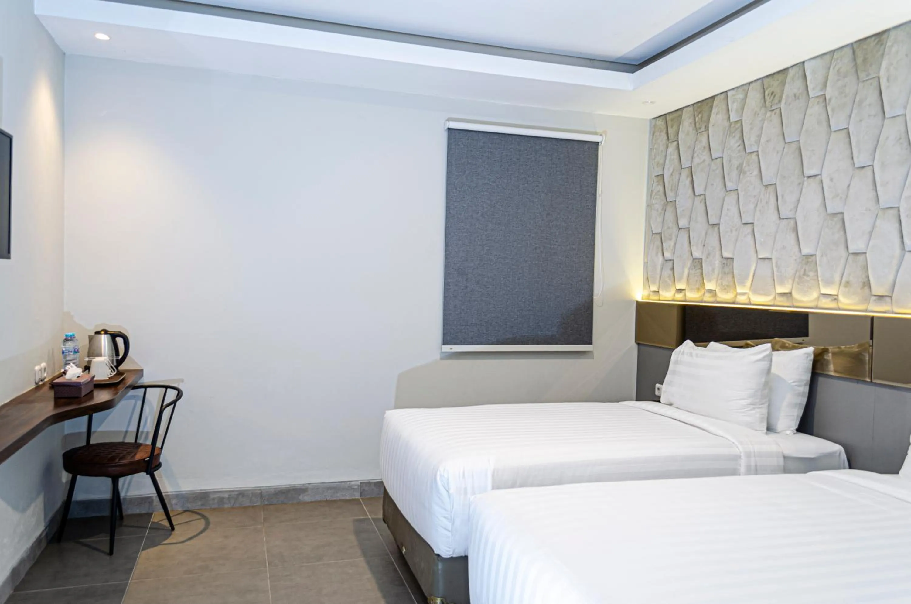 Bed in Arcadia Hotel Manado