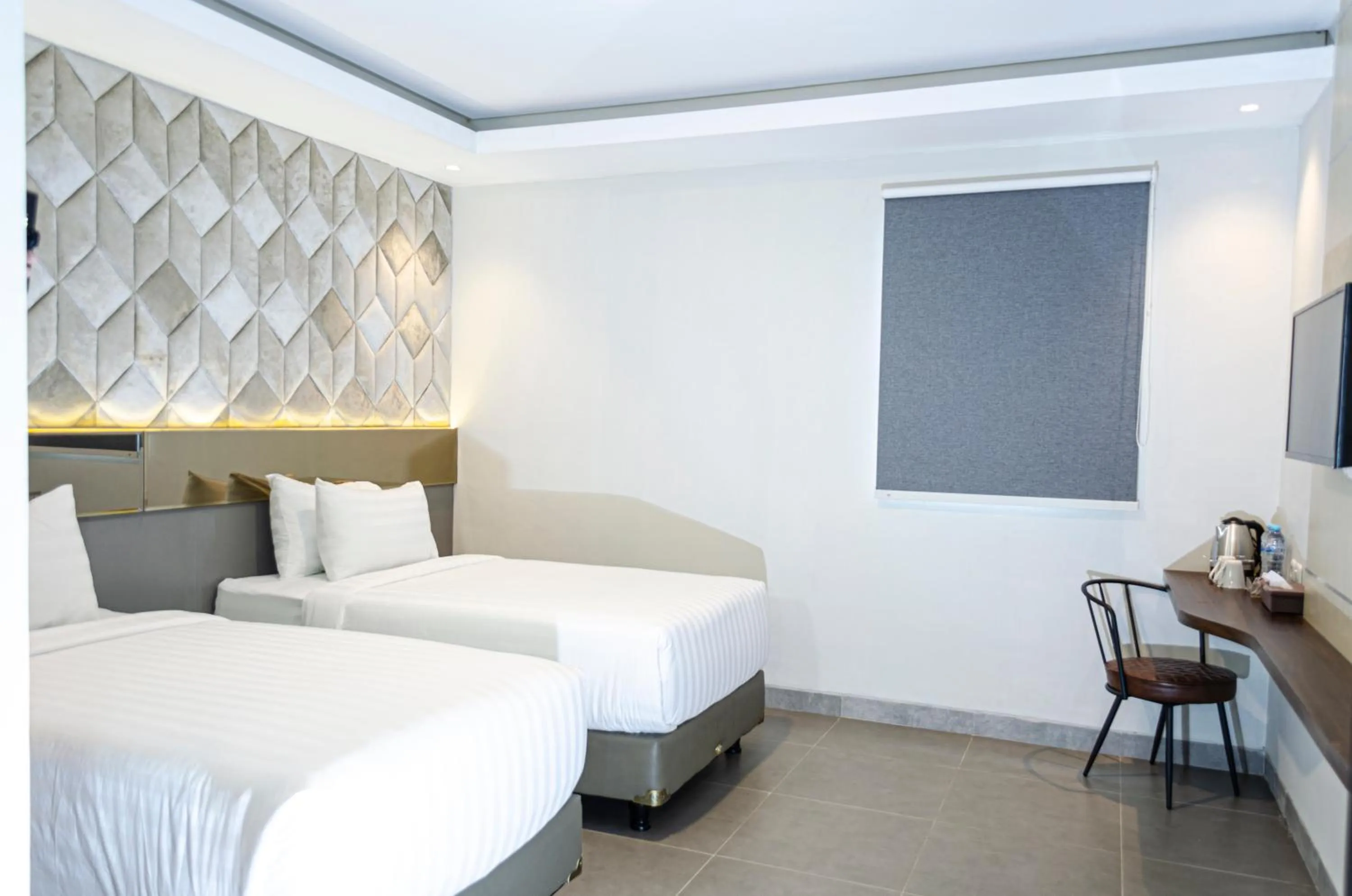 Bed in Arcadia Hotel Manado