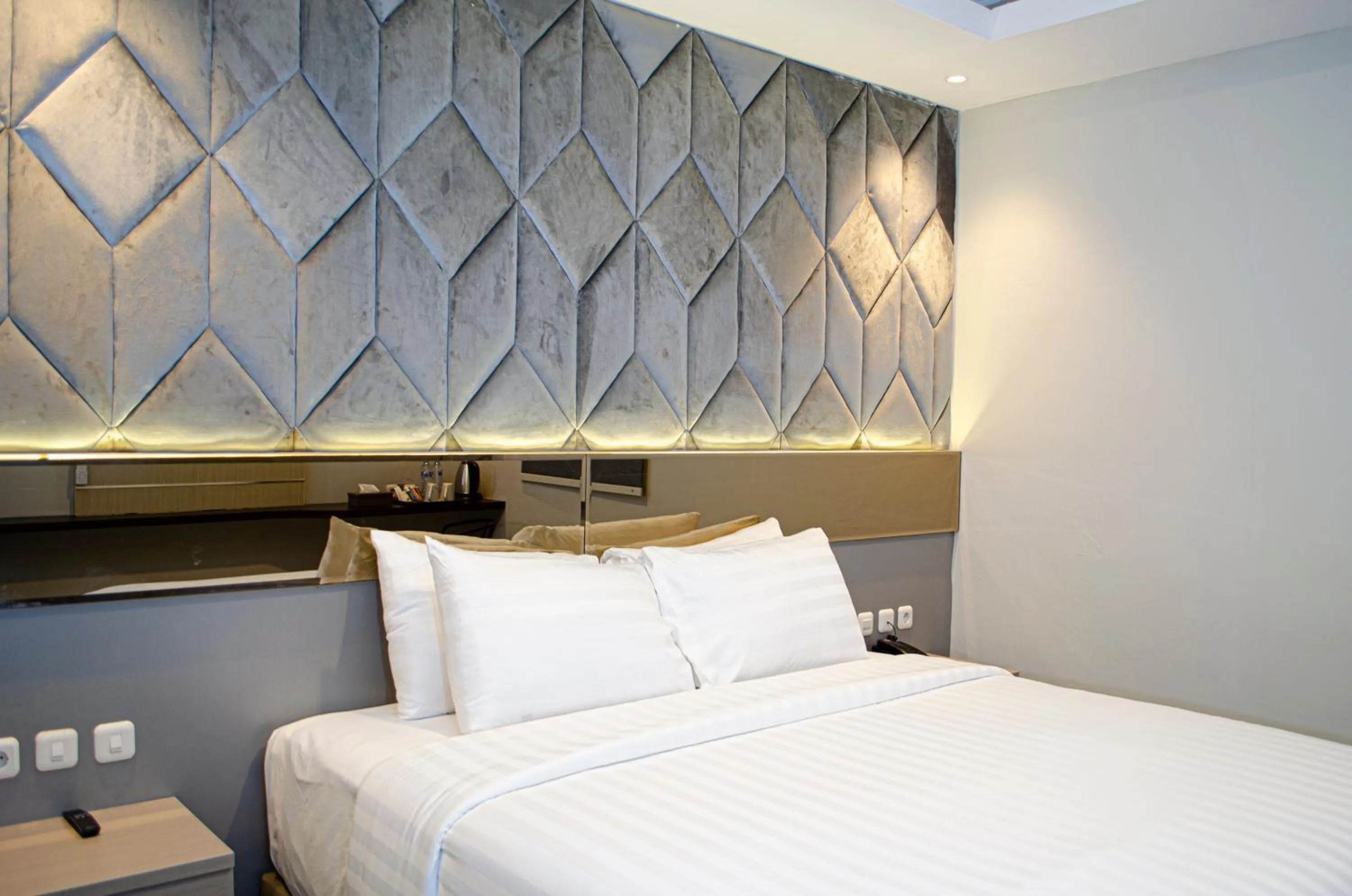 Bed in Arcadia Hotel Manado