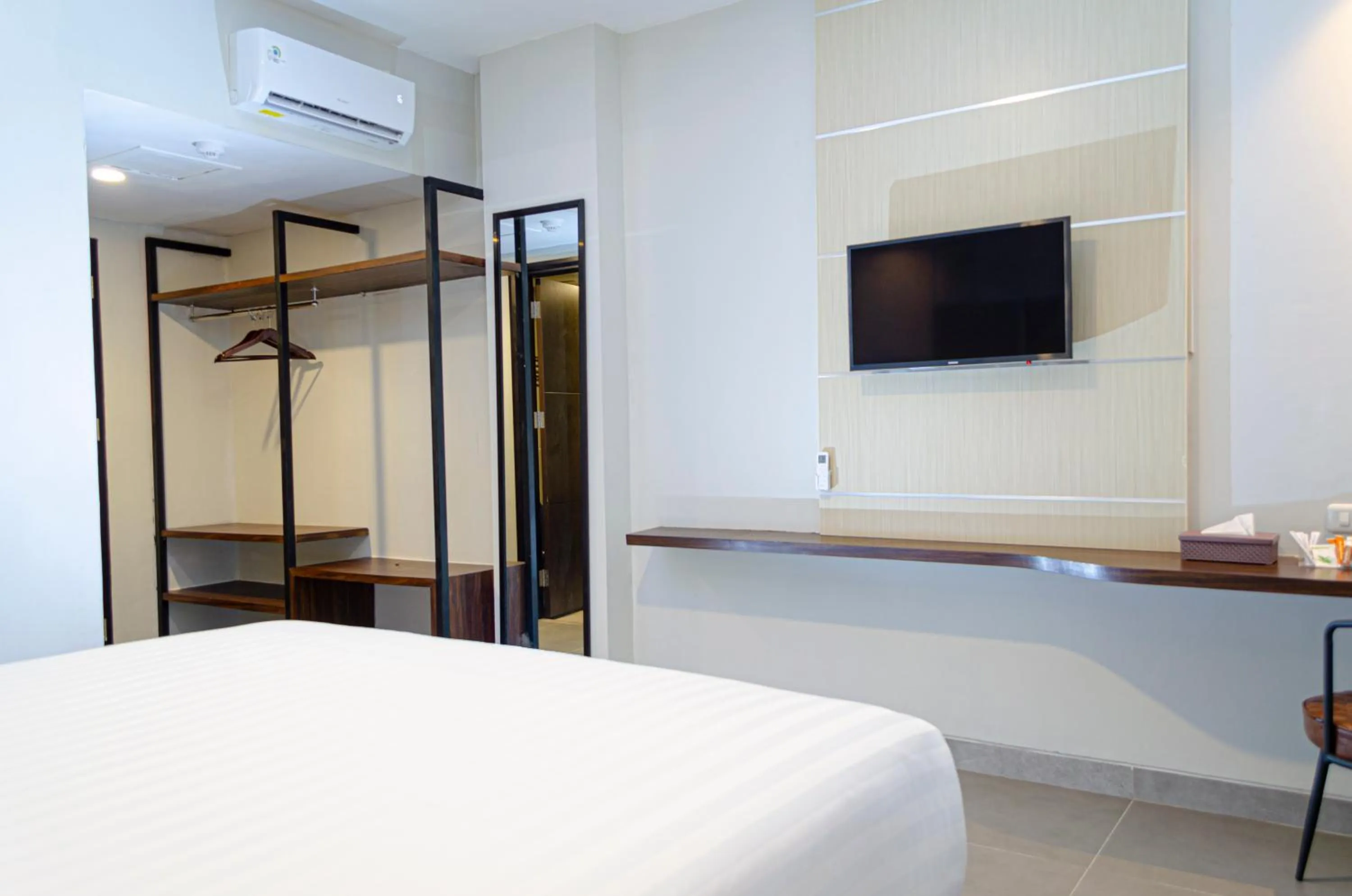 Bed in Arcadia Hotel Manado