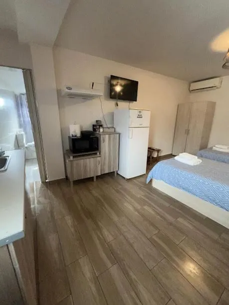 TV and multimedia, Bed in Garden Square Inn