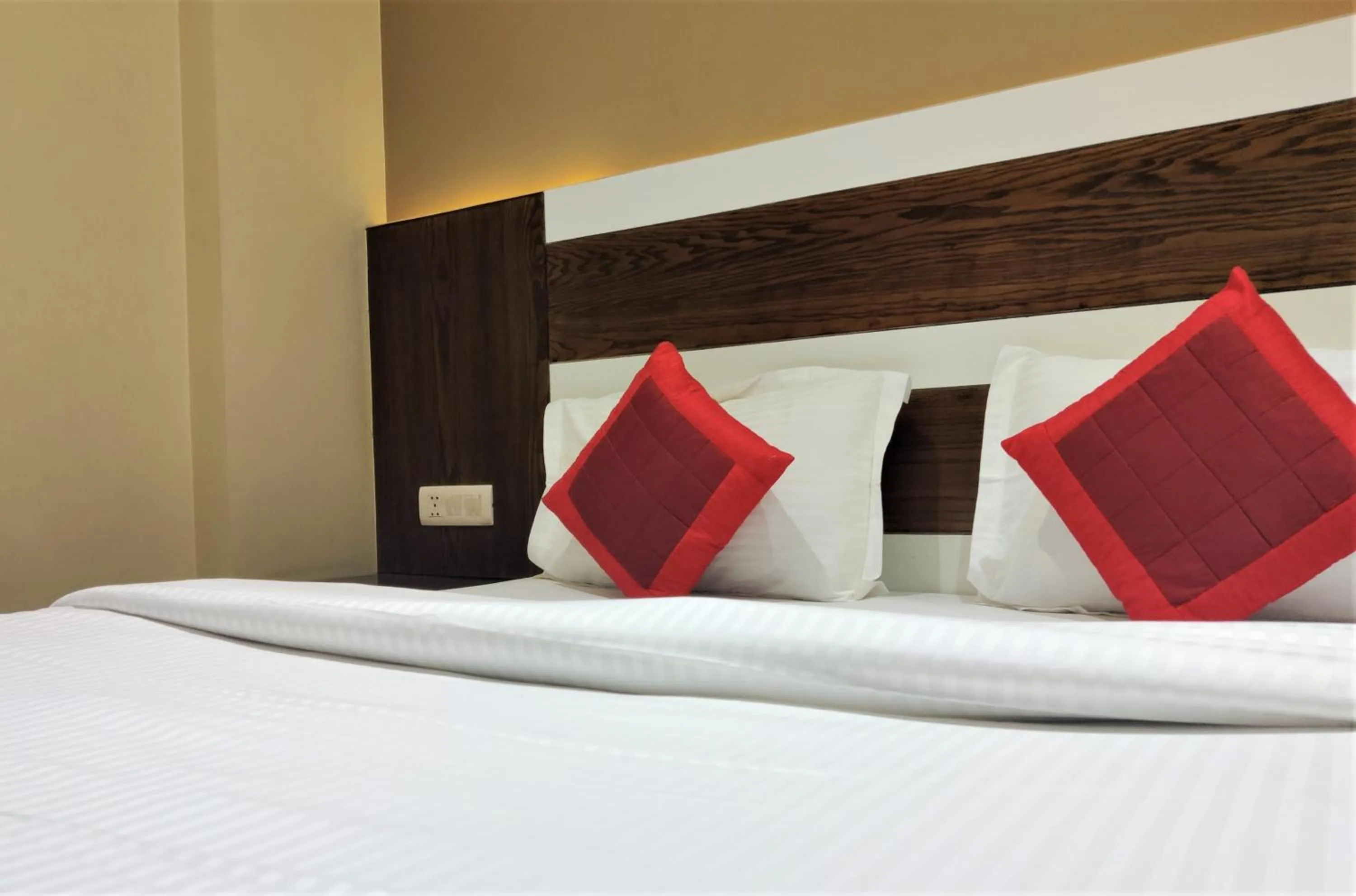 Bed in Raj Mahal Inn