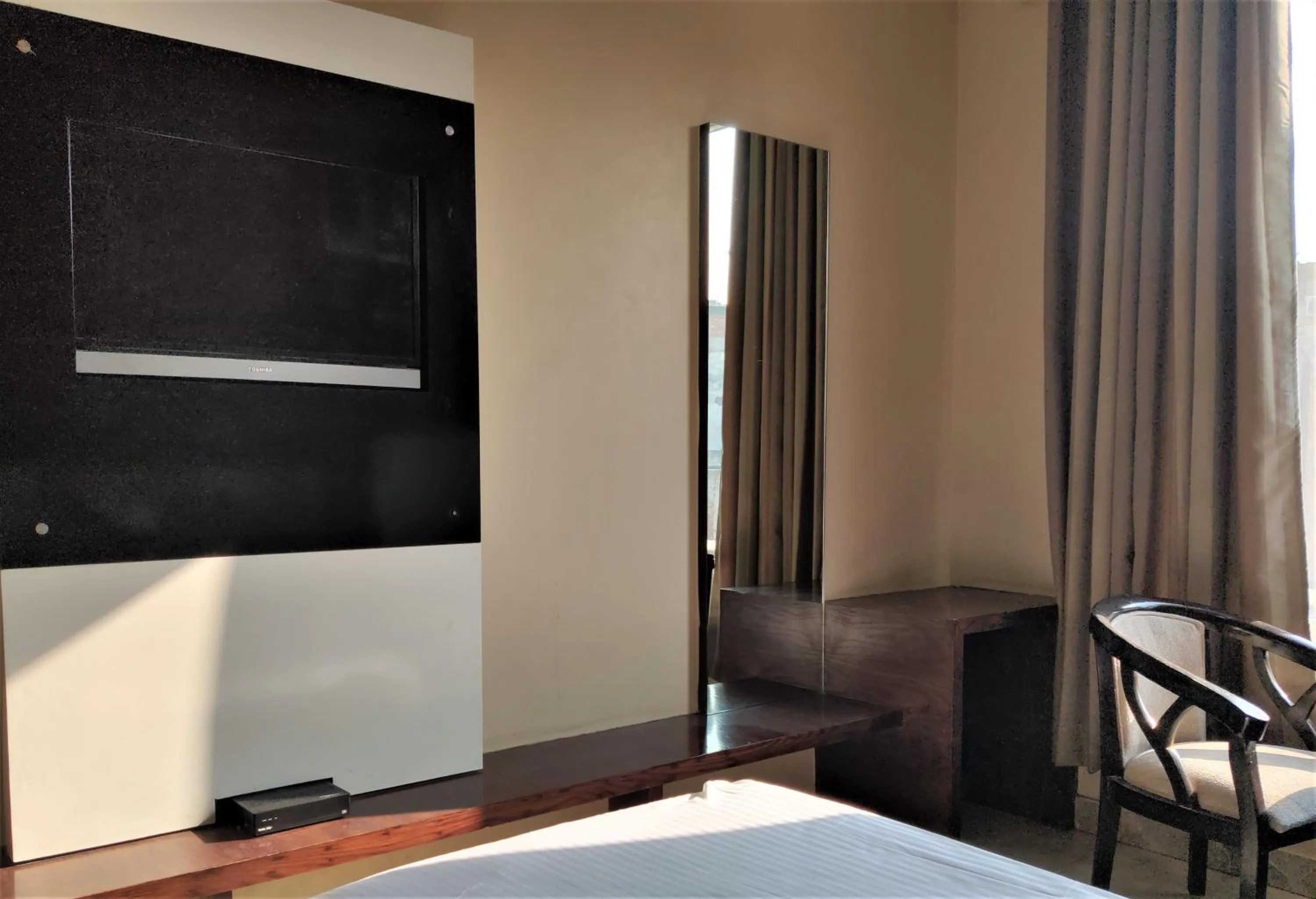 Bed in Raj Mahal Inn