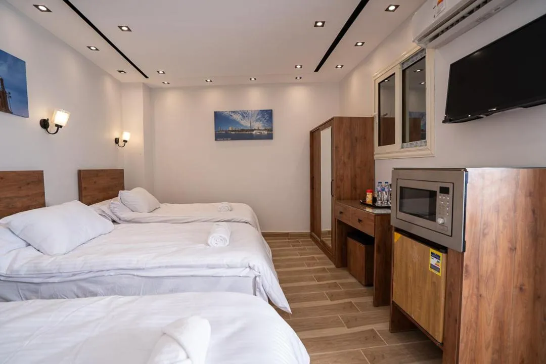 Bed in Sun and Sand Guest House