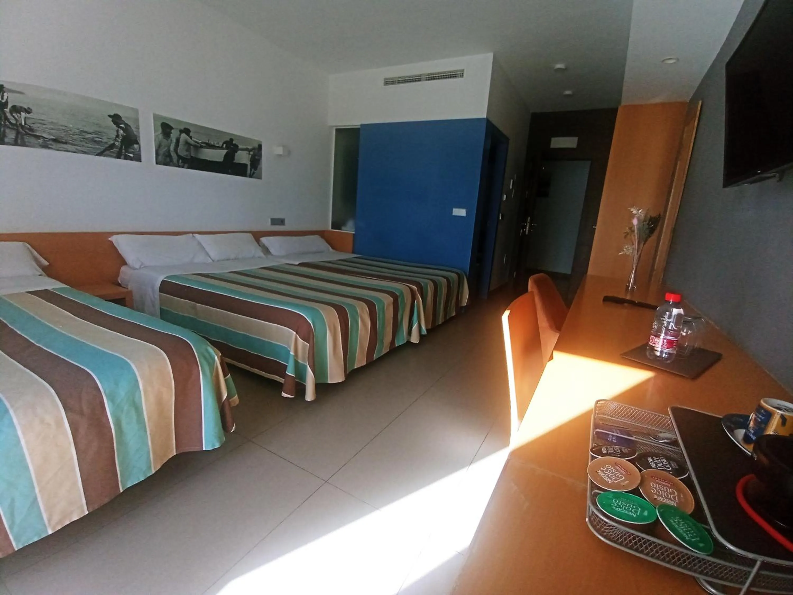 Bed in Hotel Alboran