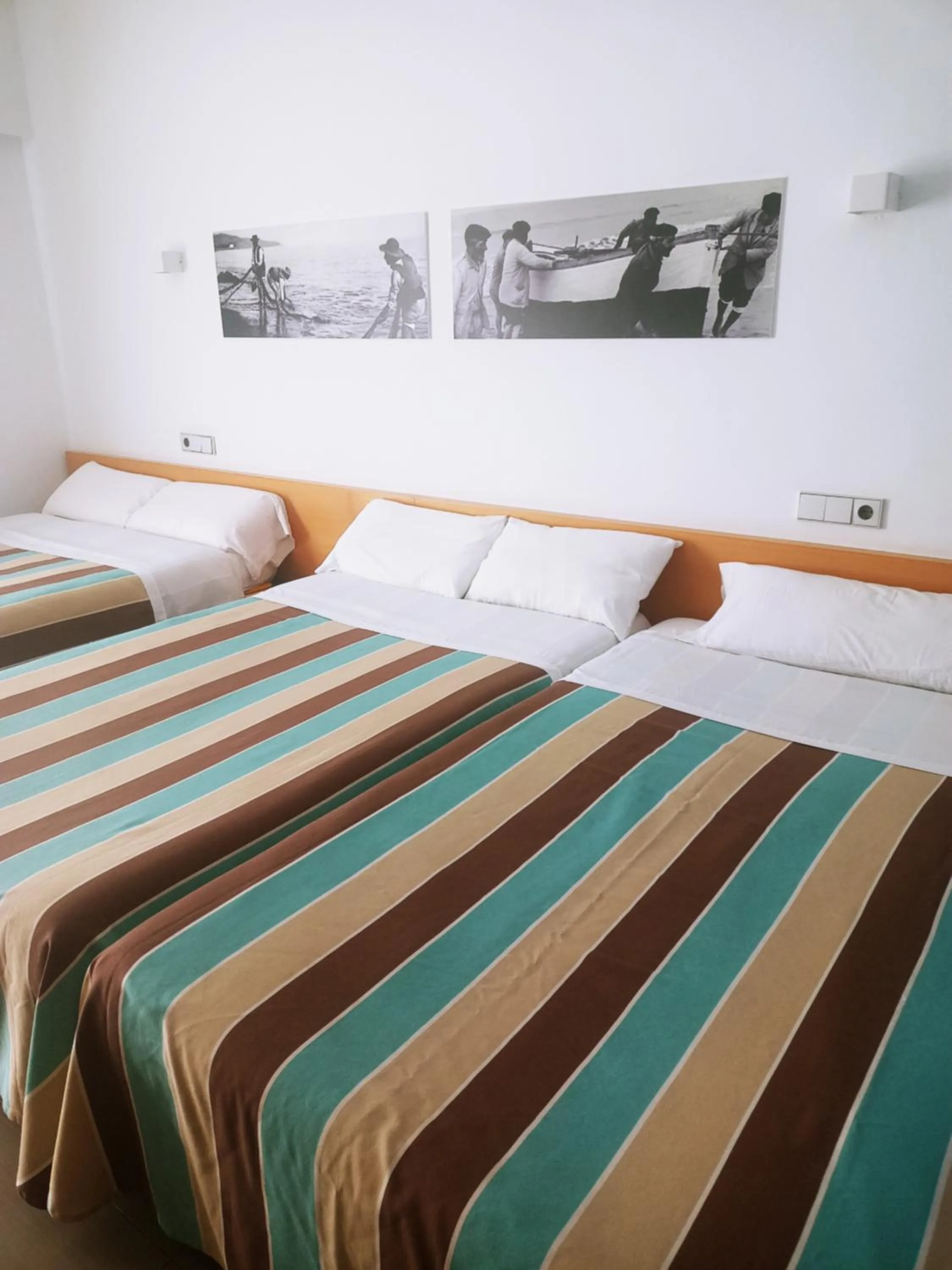 Bed in Hotel Alboran