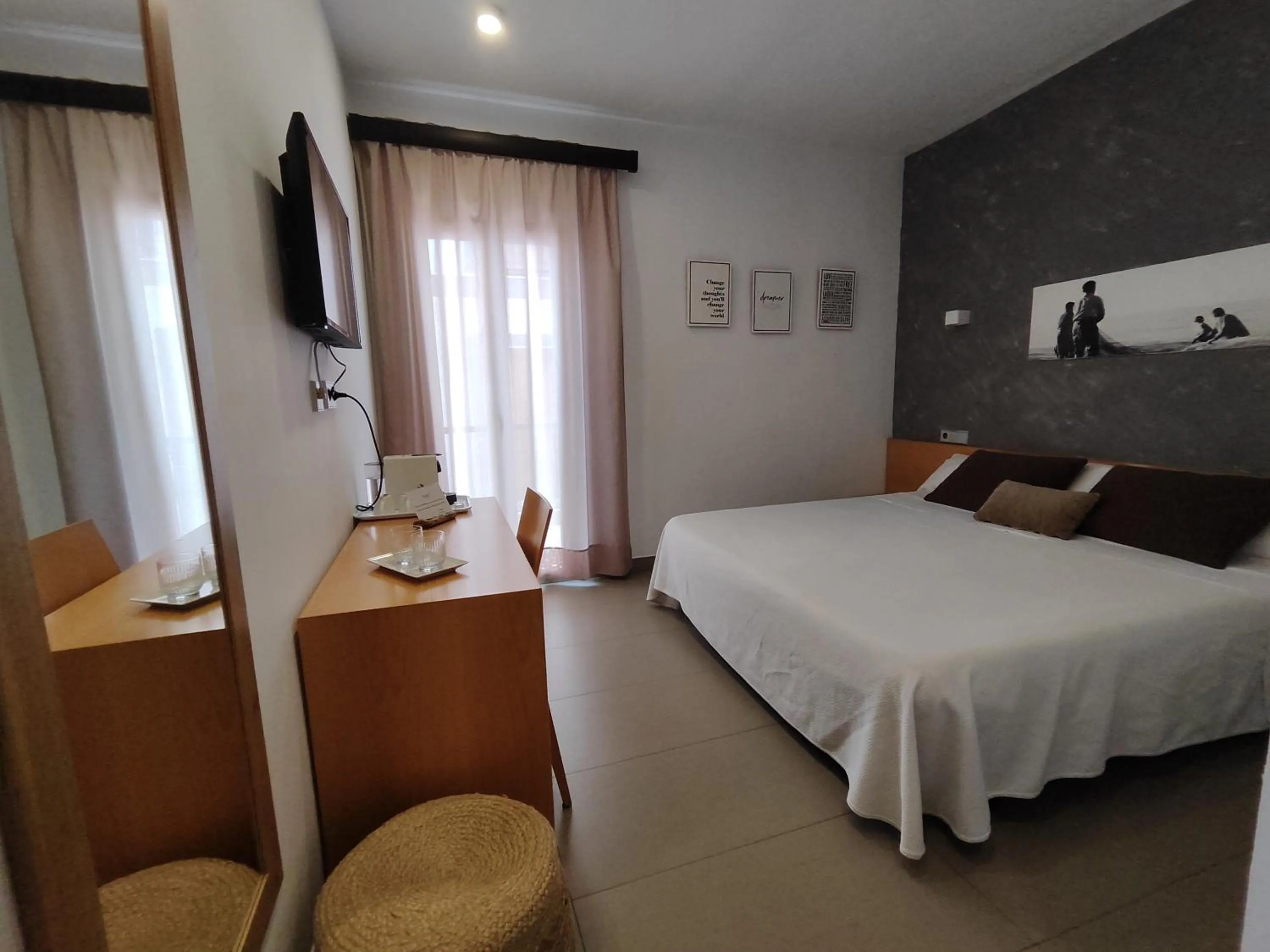 Bed in Hotel Alboran