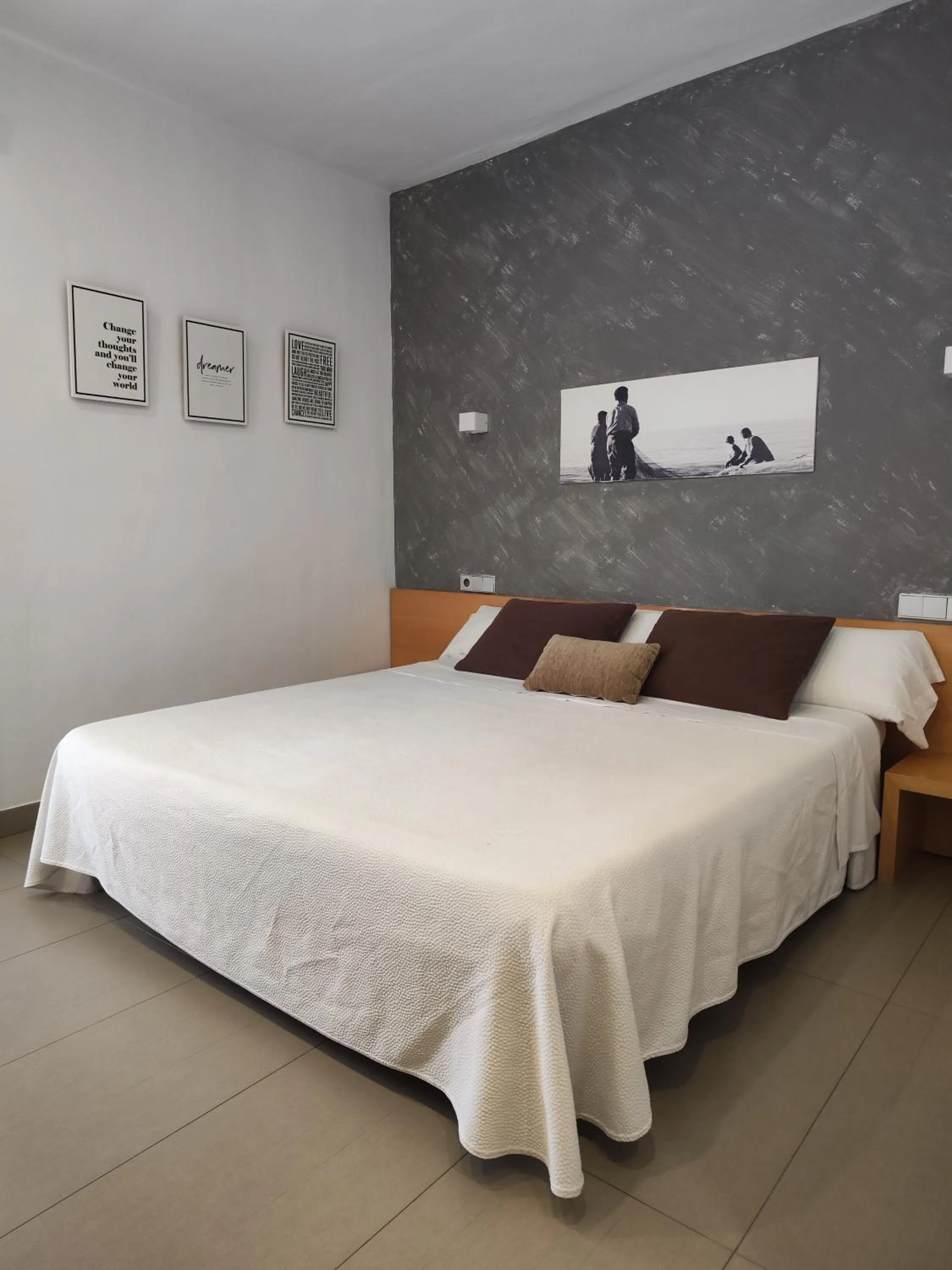 Bed in Hotel Alboran