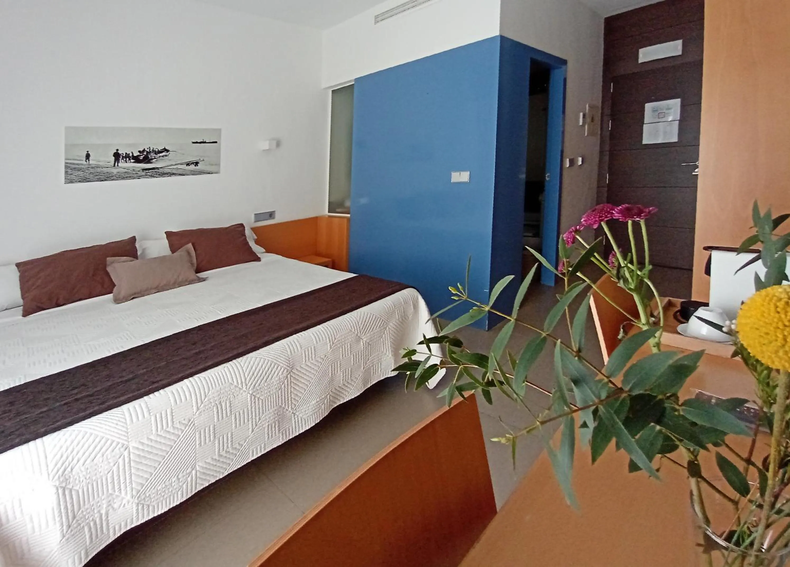 Bed in Hotel Alboran