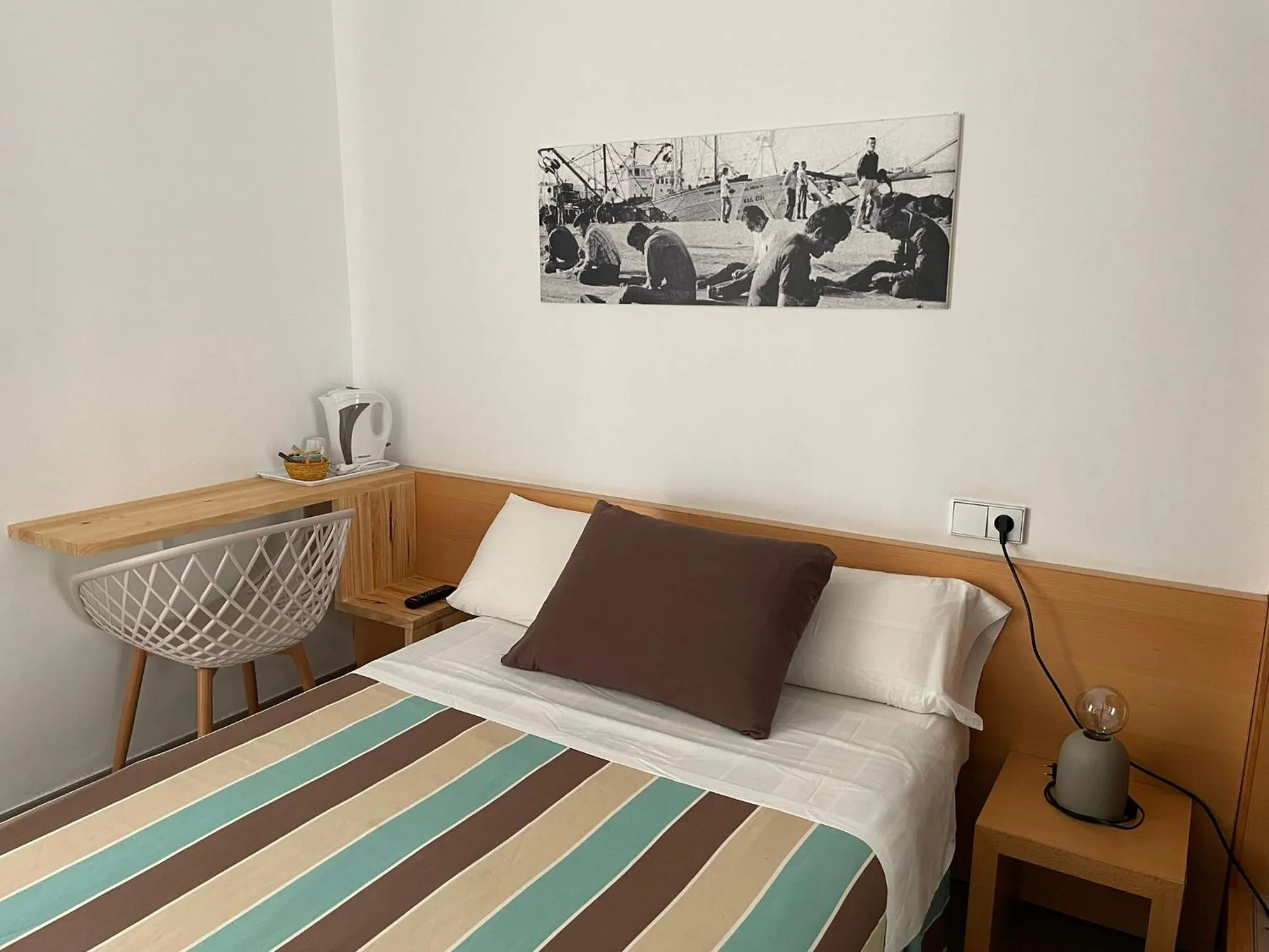 Bed in Hotel Alboran