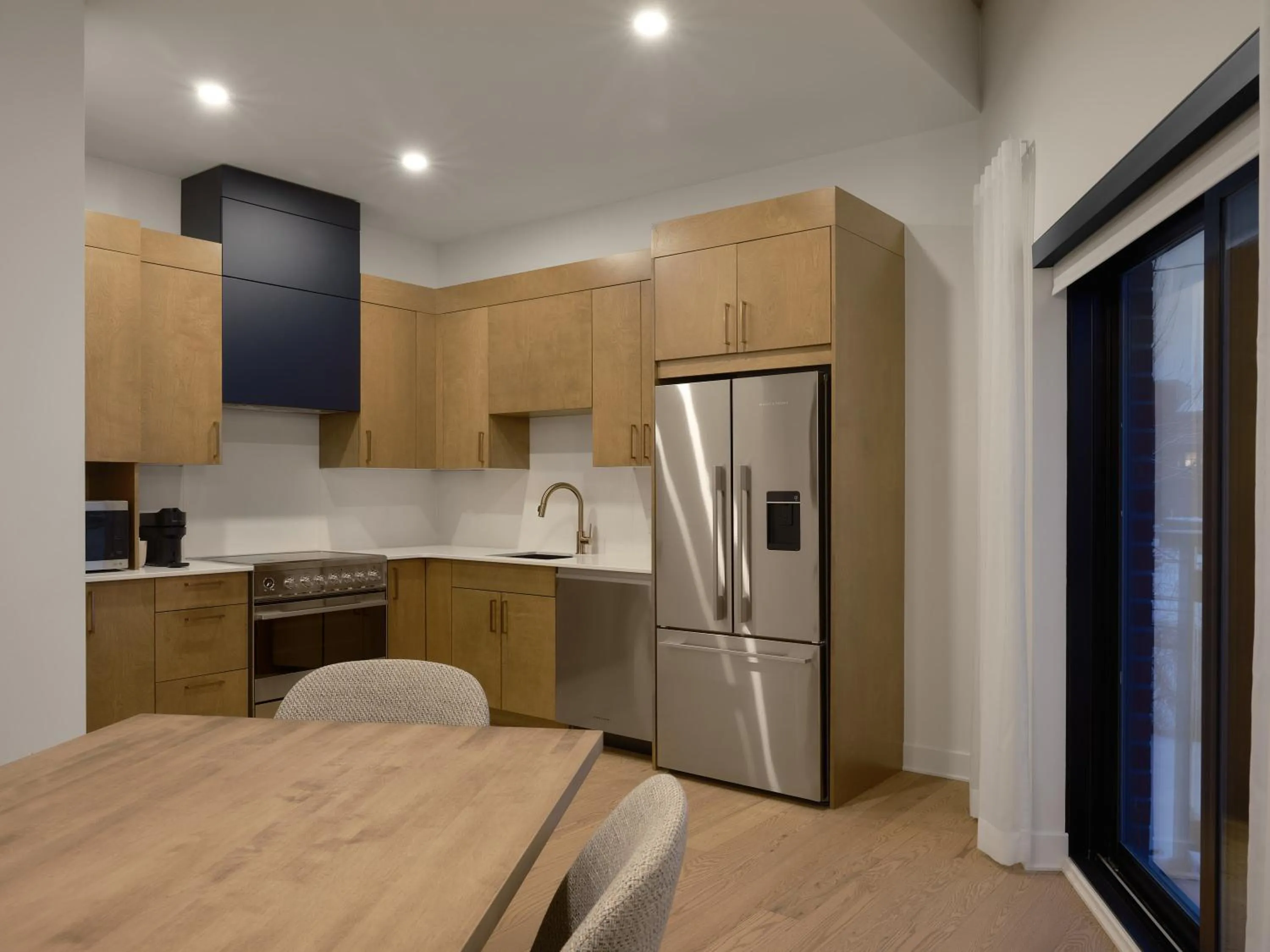 Kitchen or kitchenette in Hôtel Expérience - Quartier Des Marinas