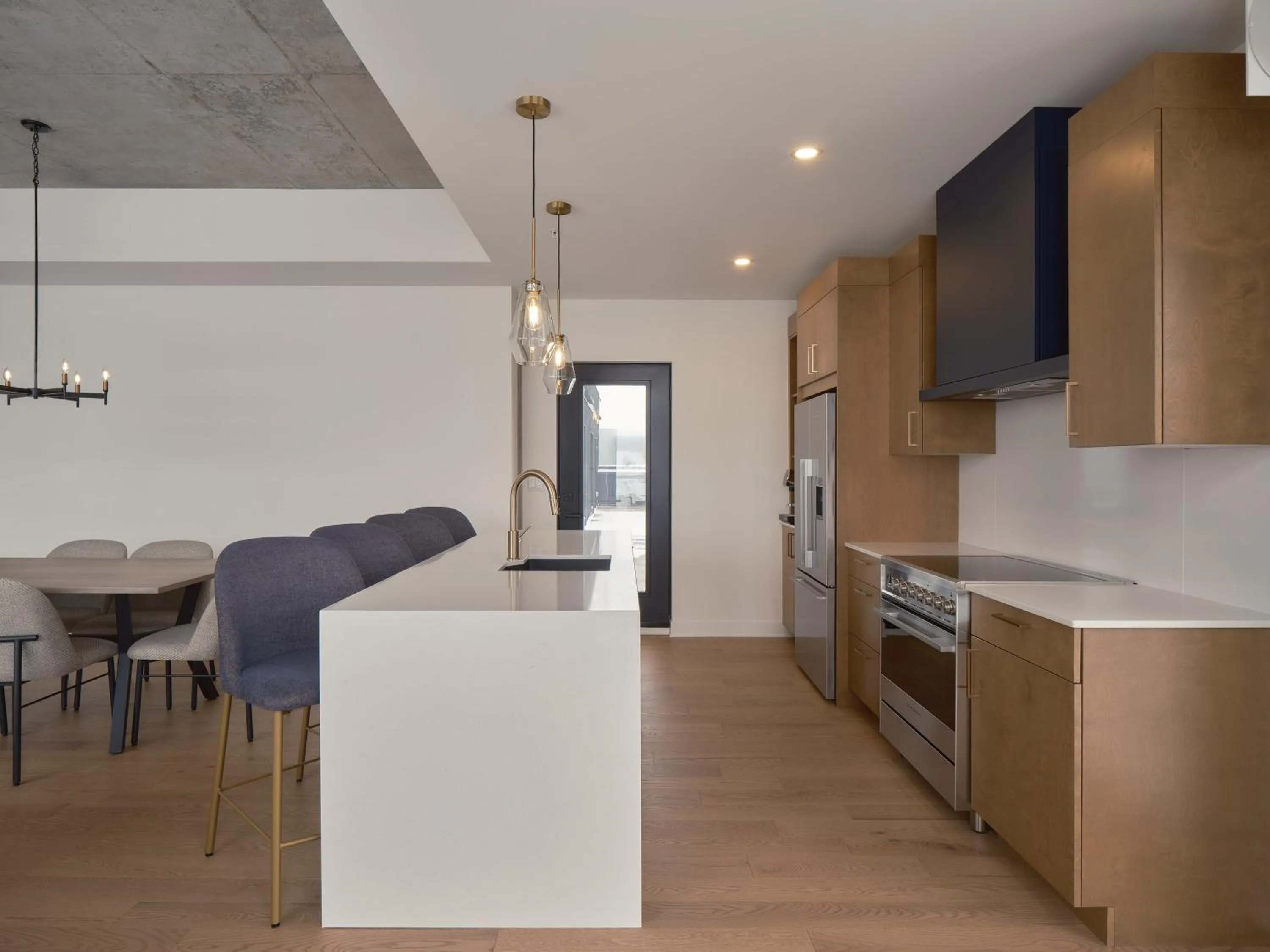 Kitchen or kitchenette in Hôtel Expérience - Quartier Des Marinas