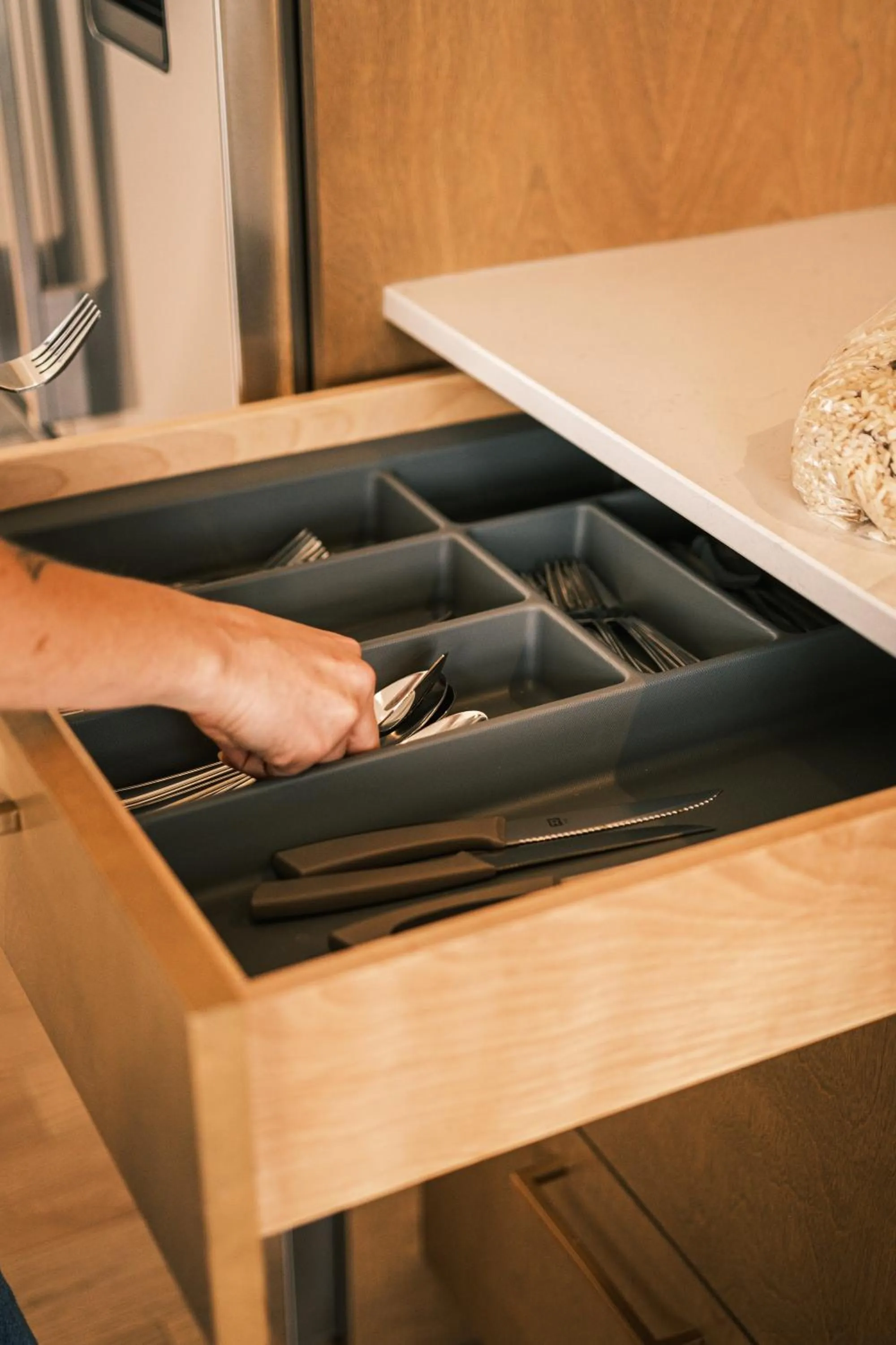 Kitchen or kitchenette in Hôtel Expérience - Quartier Des Marinas