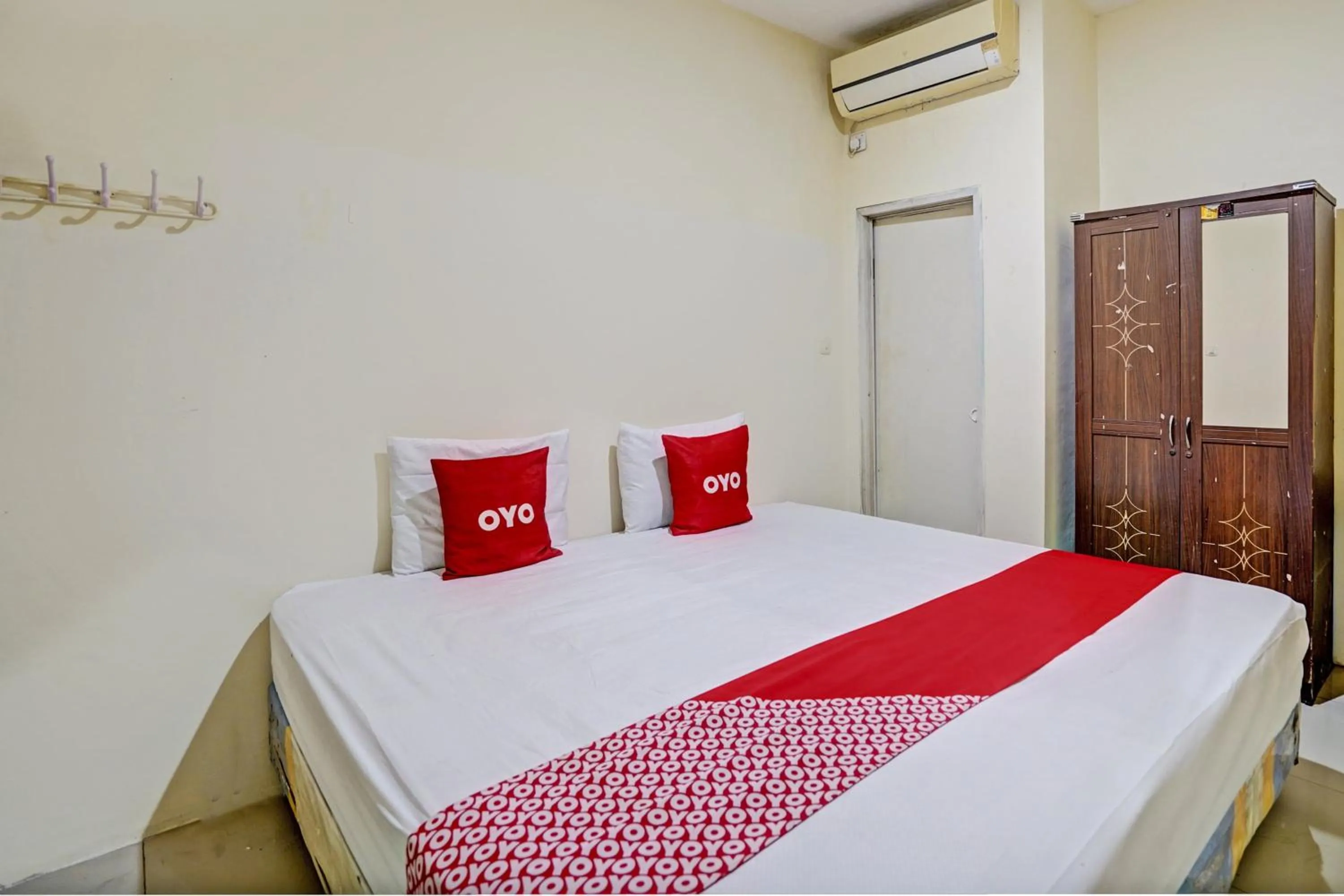 Bedroom, Bed in Hotel O Garden Homestay 3 Merlion