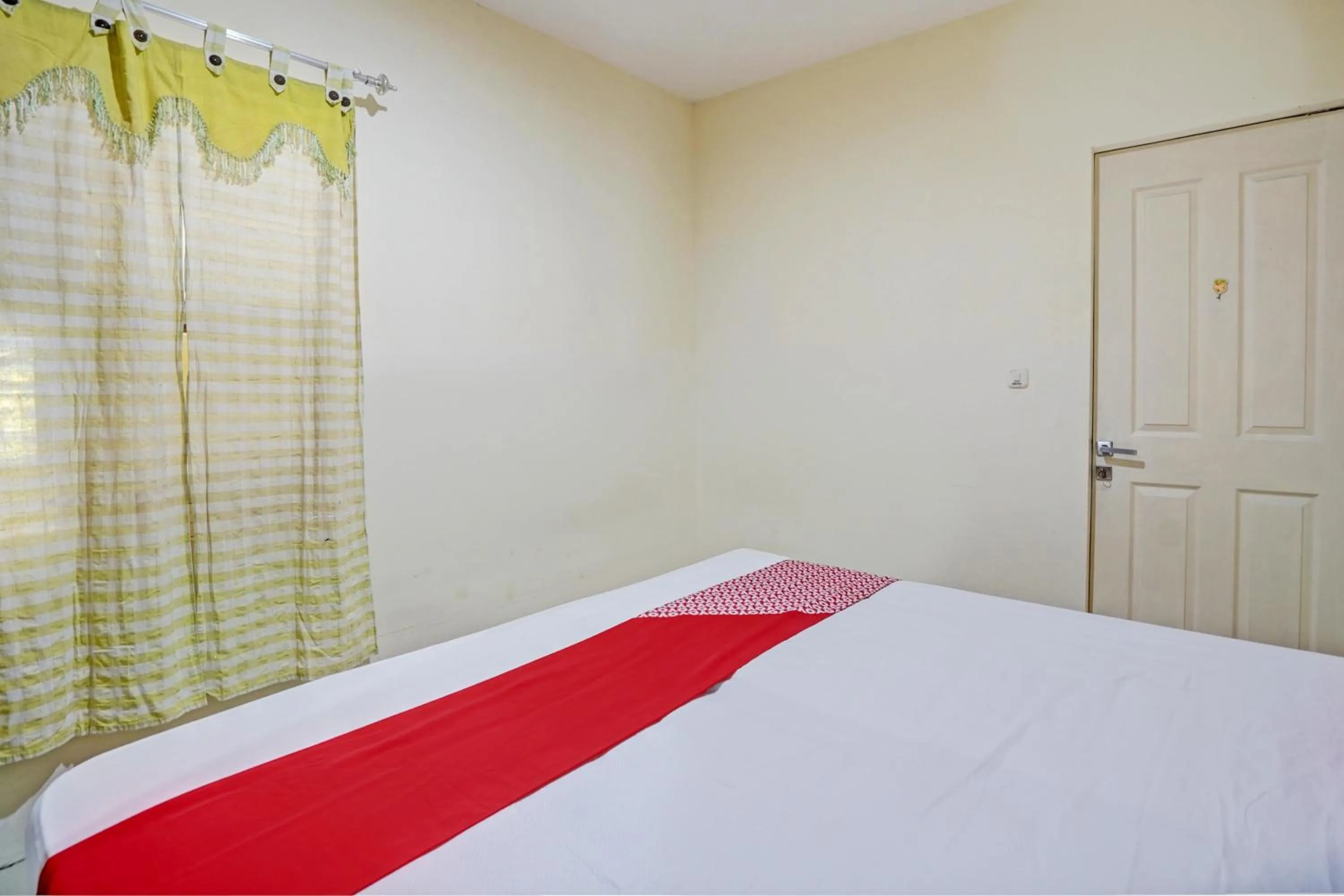 Bedroom, Bed in Hotel O Garden Homestay 3 Merlion