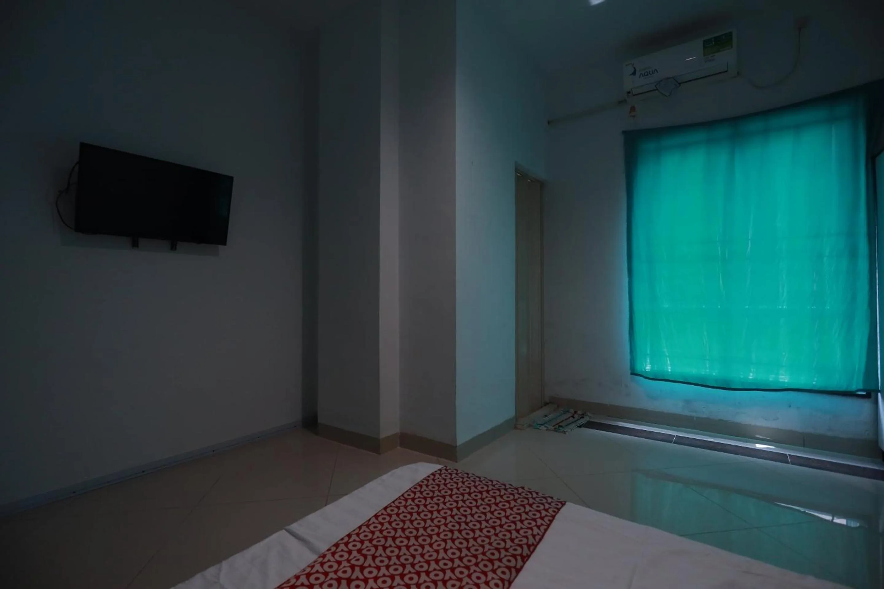 Bedroom in Hotel O Mamapapahouse