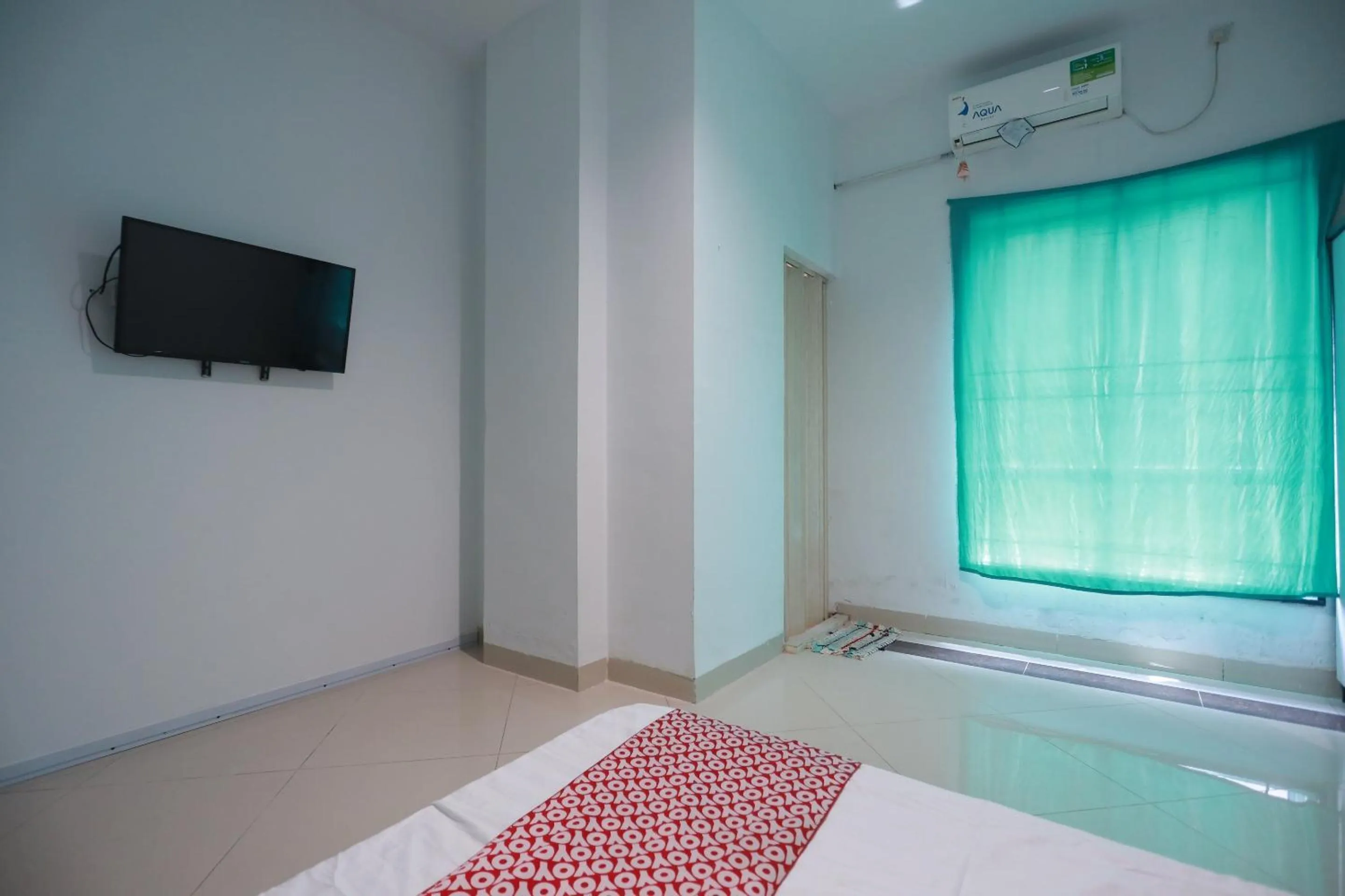 Bedroom in Hotel O Mamapapahouse