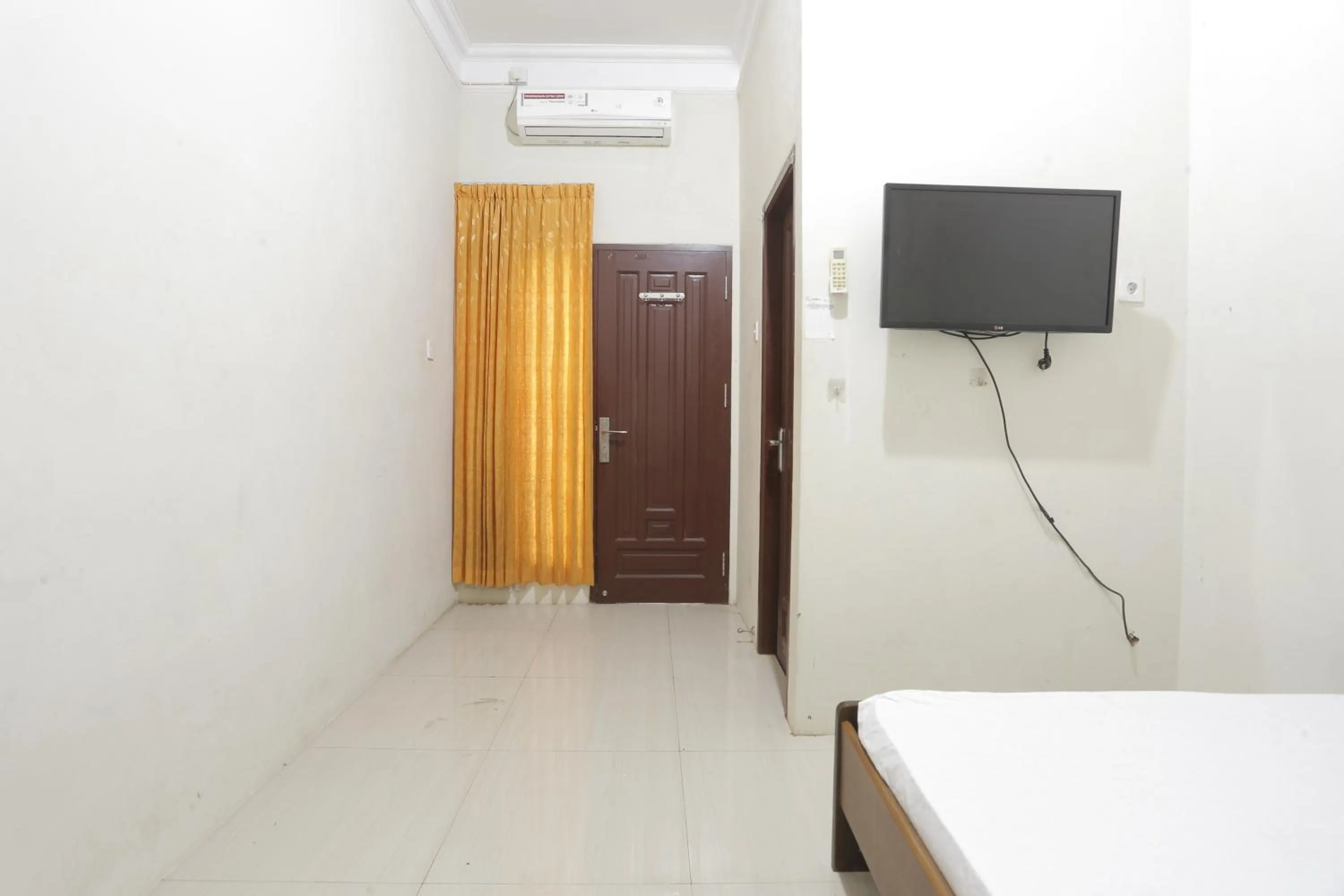 Bedroom in Hotel O Guest House Leo Patra