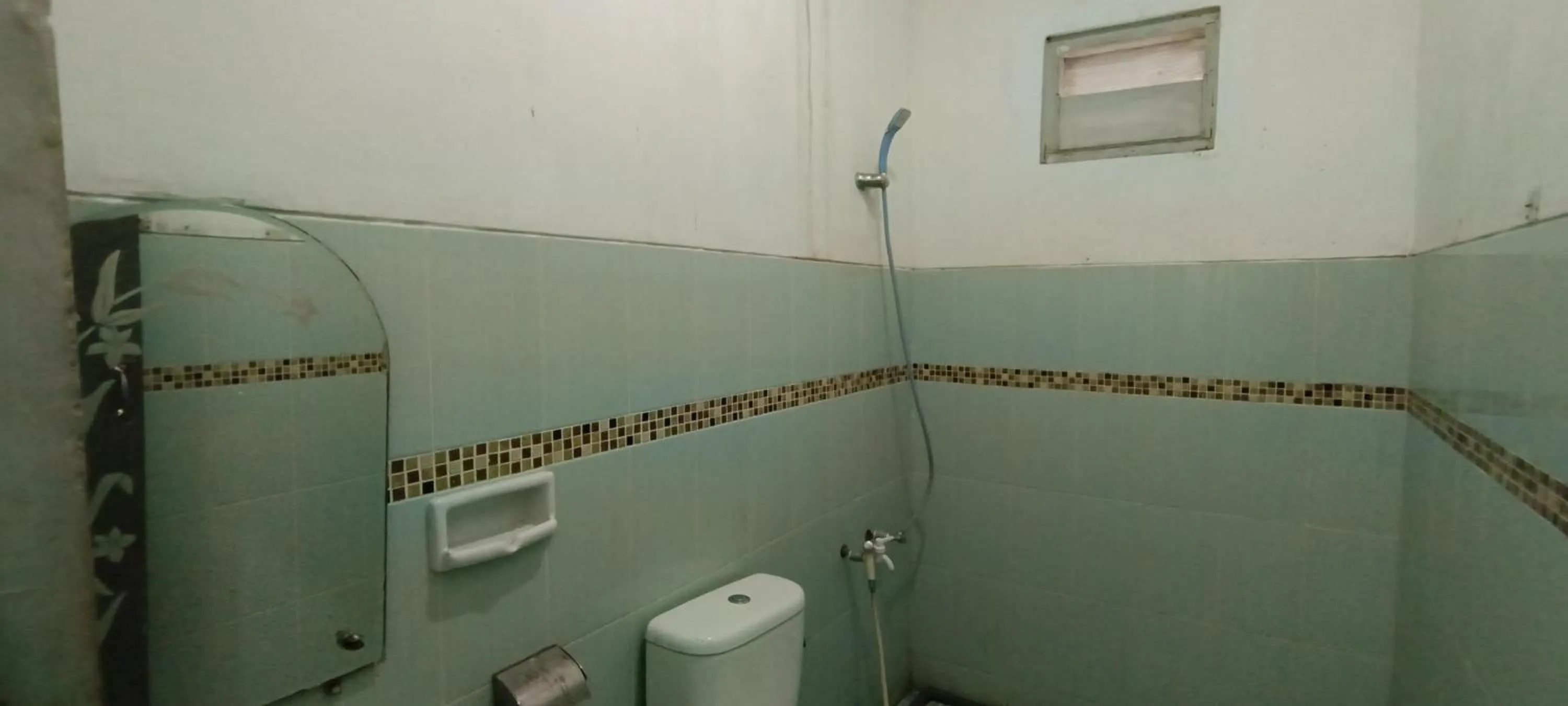 Bathroom in Hotel O Wisma Hamalau SyariahNearPulau Bromo Pedestrian Bridge