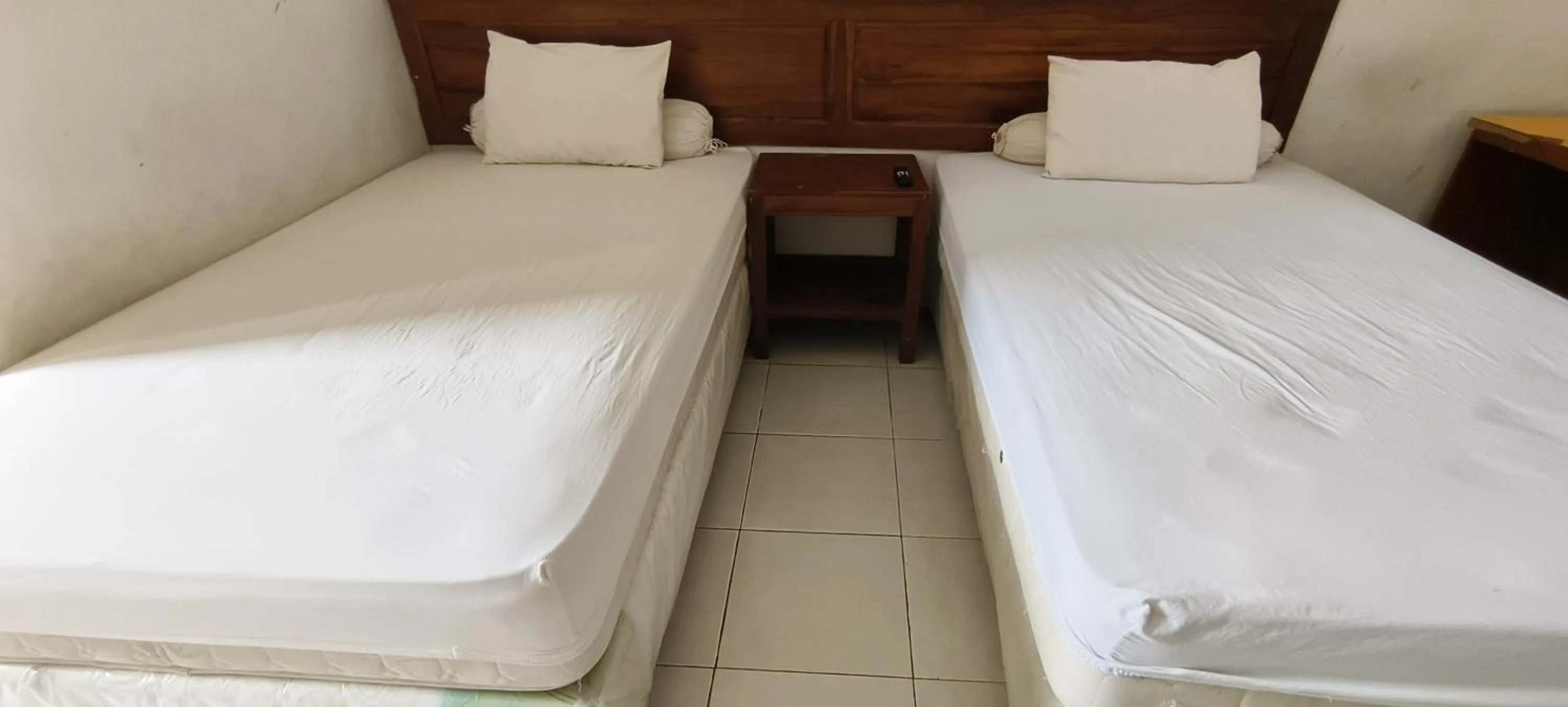 Bedroom, Bed in Hotel O Wisma Hamalau SyariahNearPulau Bromo Pedestrian Bridge