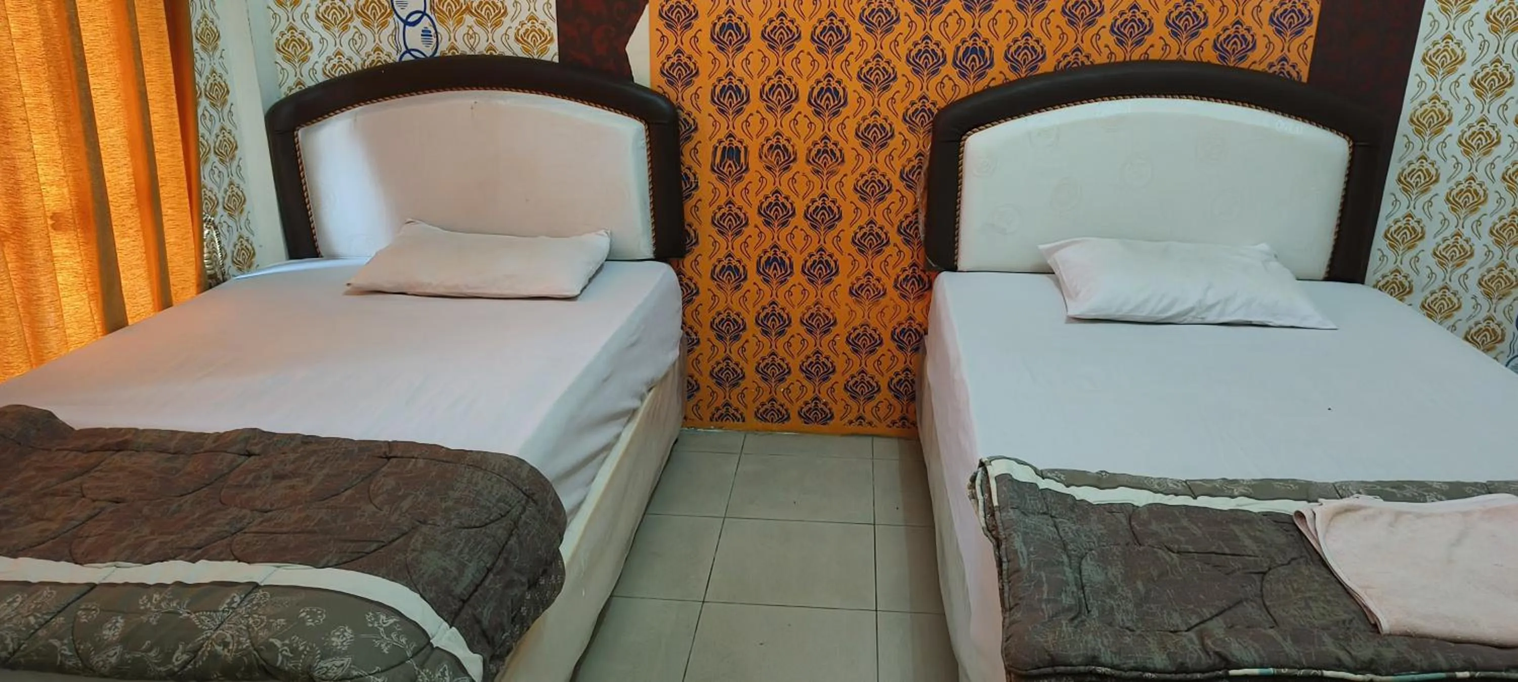 Bedroom, Bed in Hotel O Wisma Hamalau SyariahNearPulau Bromo Pedestrian Bridge