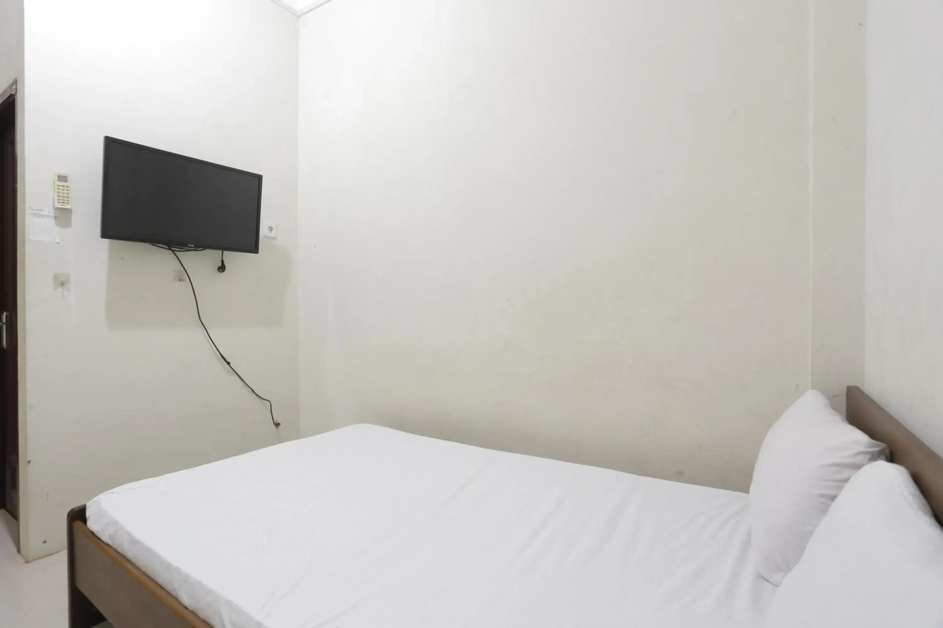 Bedroom, Bed in Hotel O Penginapan Budhe Sri Bedroom, Bed in Hotel O Penginapan Budhe Sri